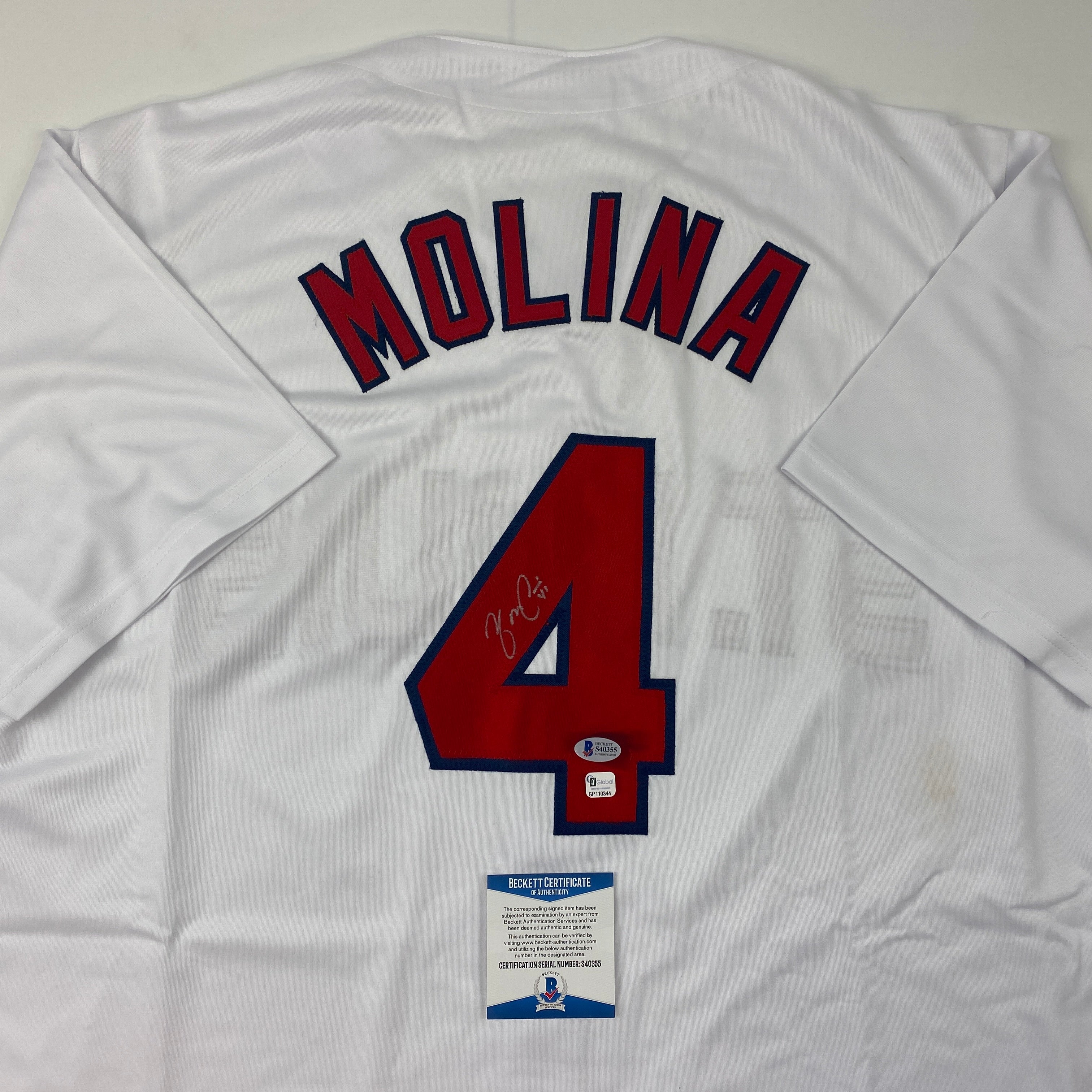 autographed-signed-yadier-molina-st-louis-white-baseball-jersey-beckett-bas-coa