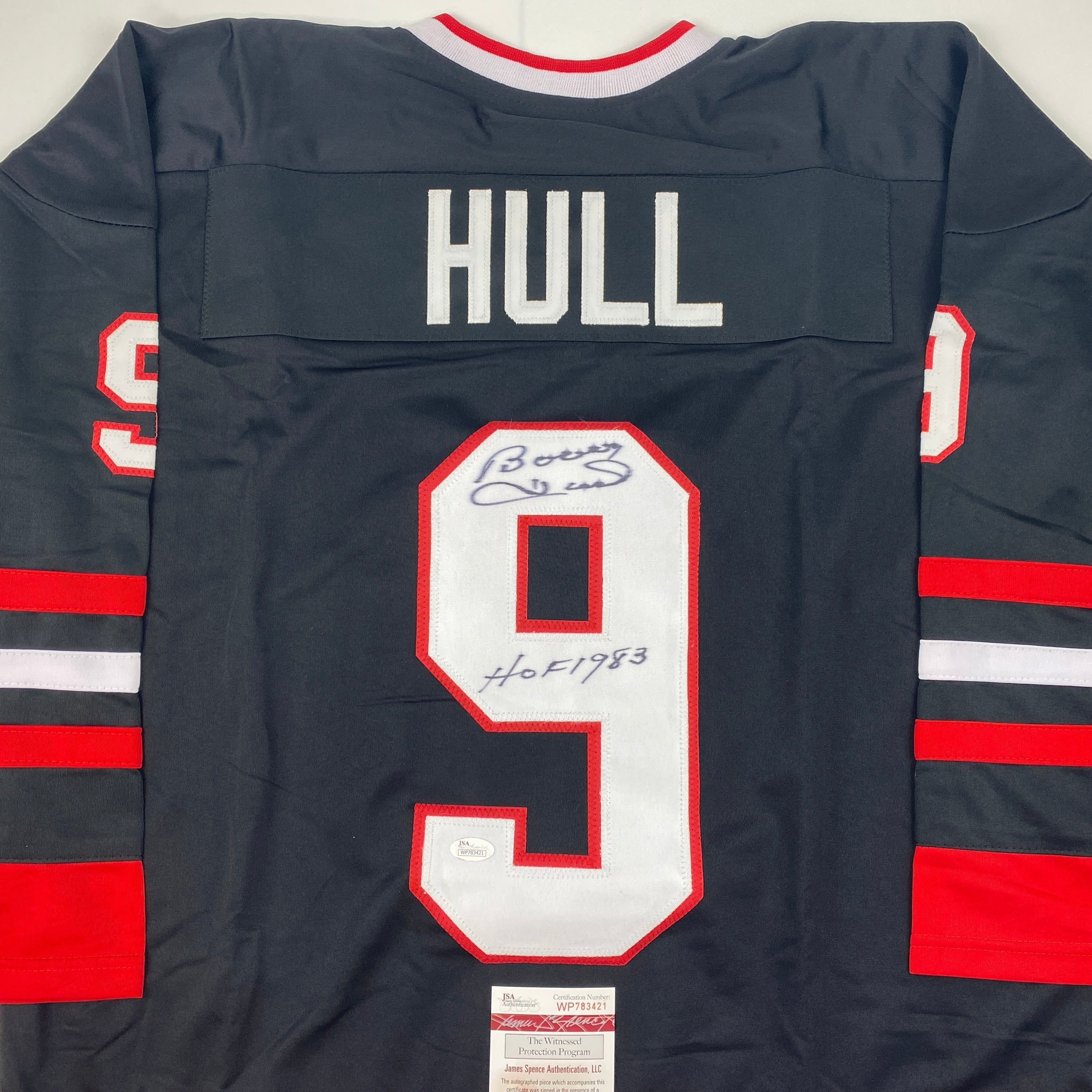 autographed-signed-bobby-hull-hof-1983-chicago-black-hockey-jersey-jsa-coa
