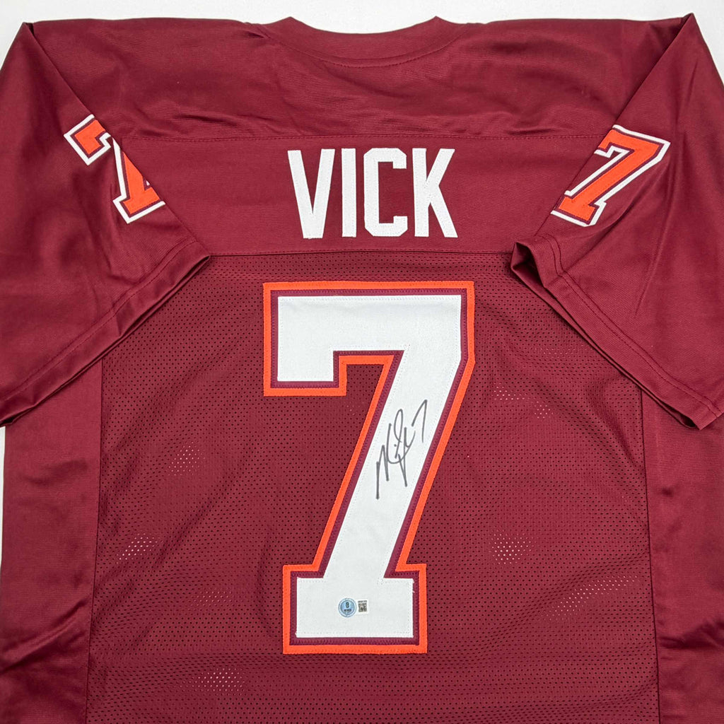 autographed-signed-michael-mike-vick-virginia-tech-maroon-college-football-jersey-beckett-bas-coa