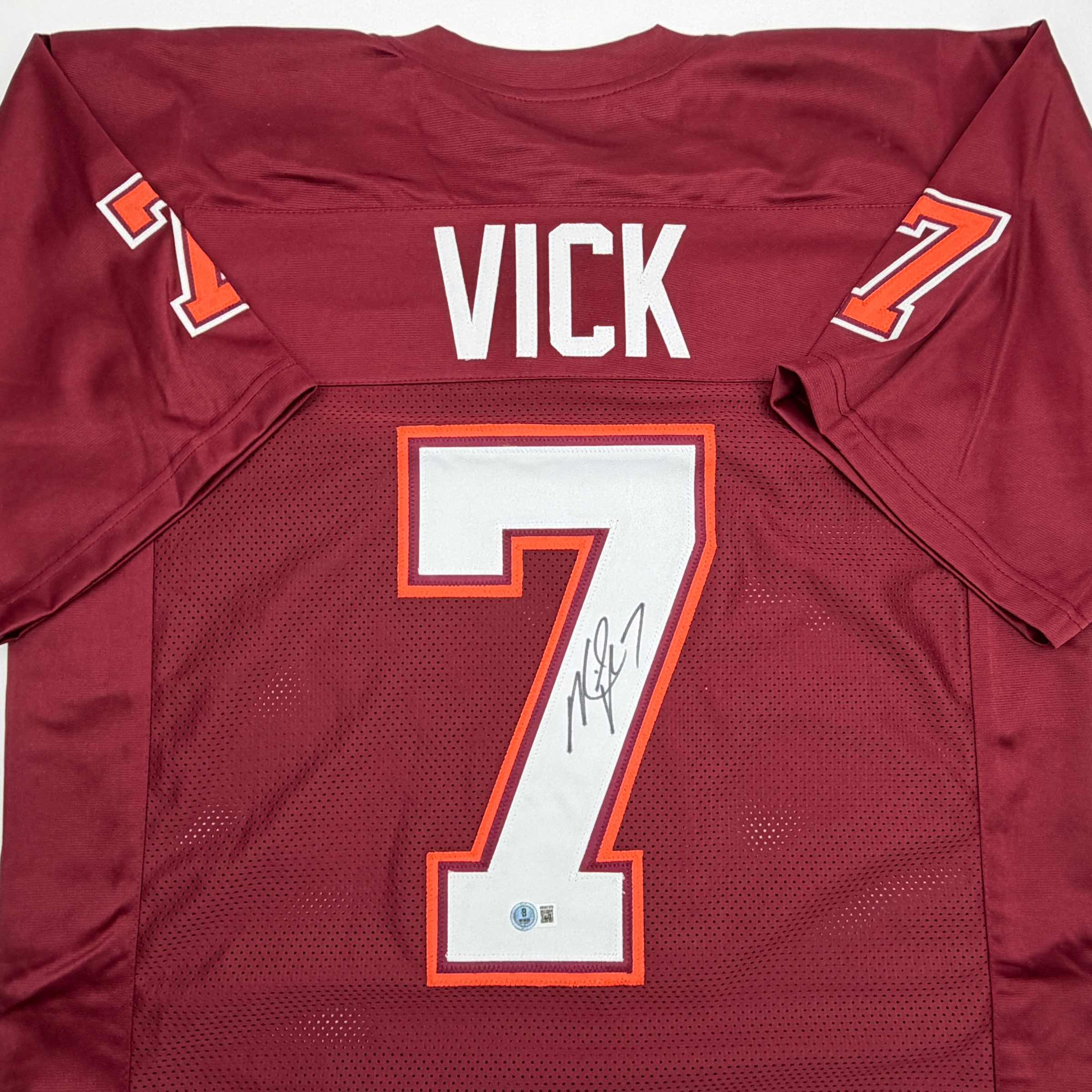 autographed-signed-michael-mike-vick-virginia-tech-maroon-college-football-jersey-beckett-bas-coa