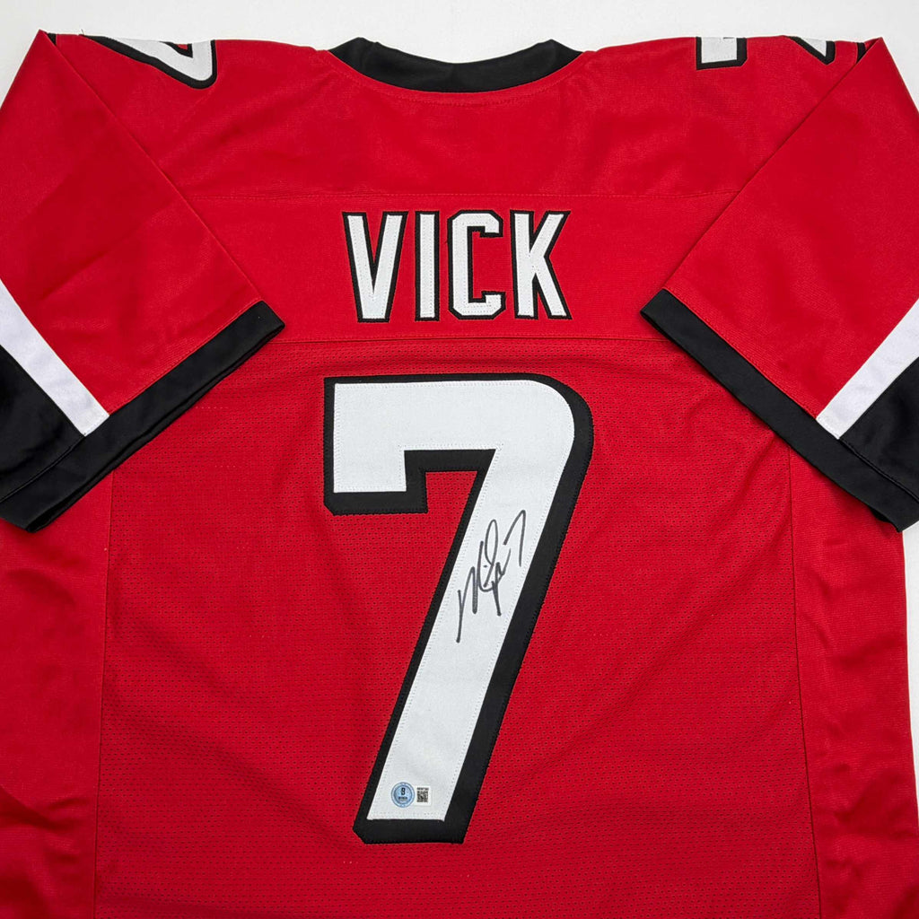 autographed-signed-michael-mike-vick-atlanta-red-football-jersey-beckett-bas-coa