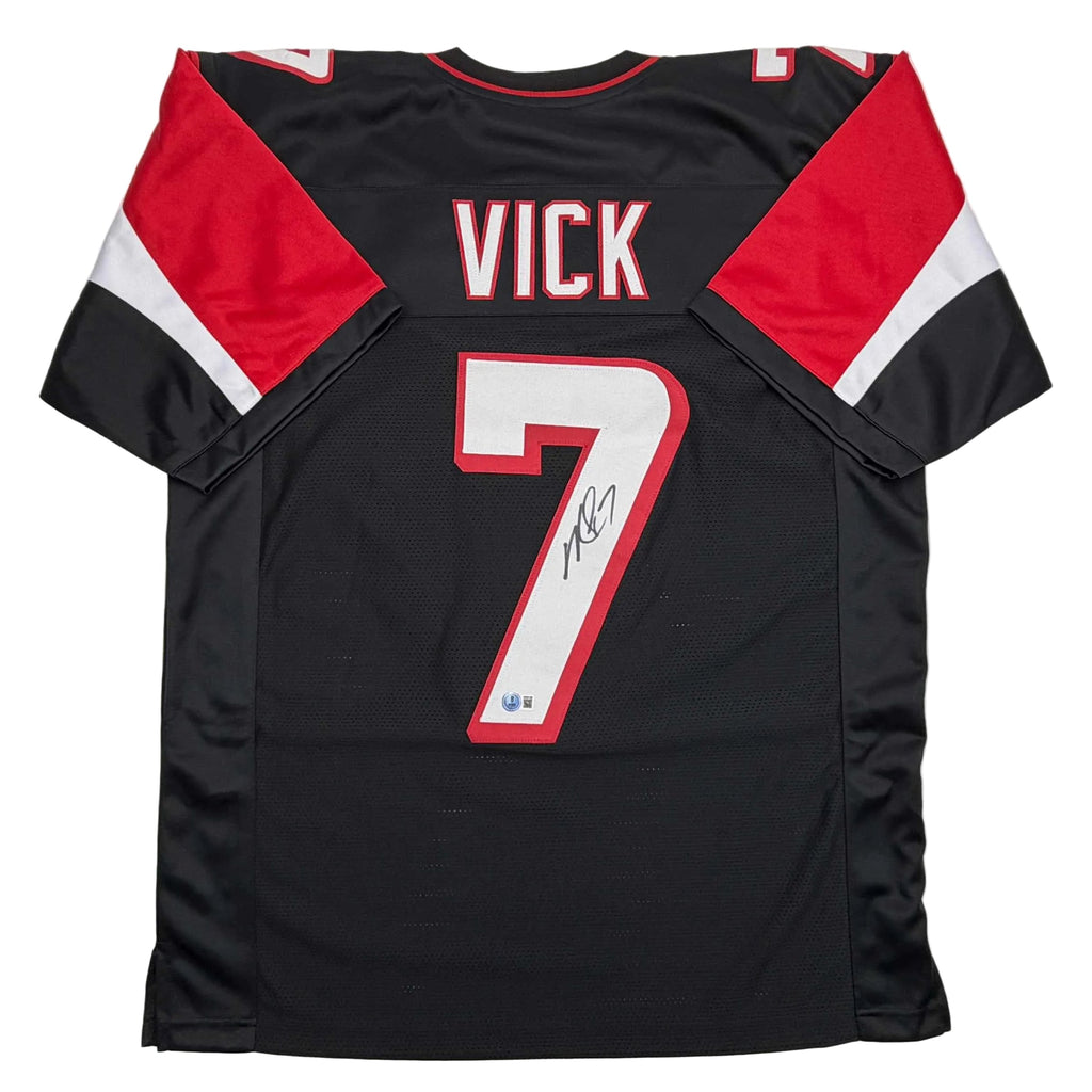 autographed-signed-michael-mike-vick-atlanta-black-football-jersey-beckett-bas-coa