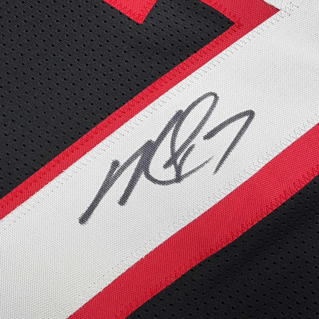autographed-signed-michael-mike-vick-atlanta-black-football-jersey-beckett-bas-coa