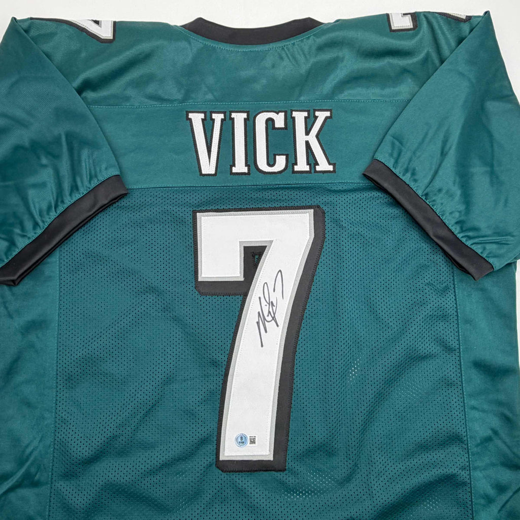 autographed-signed-michael-mike-vick-philadelphia-green-football-jersey-beckett-bas-coa