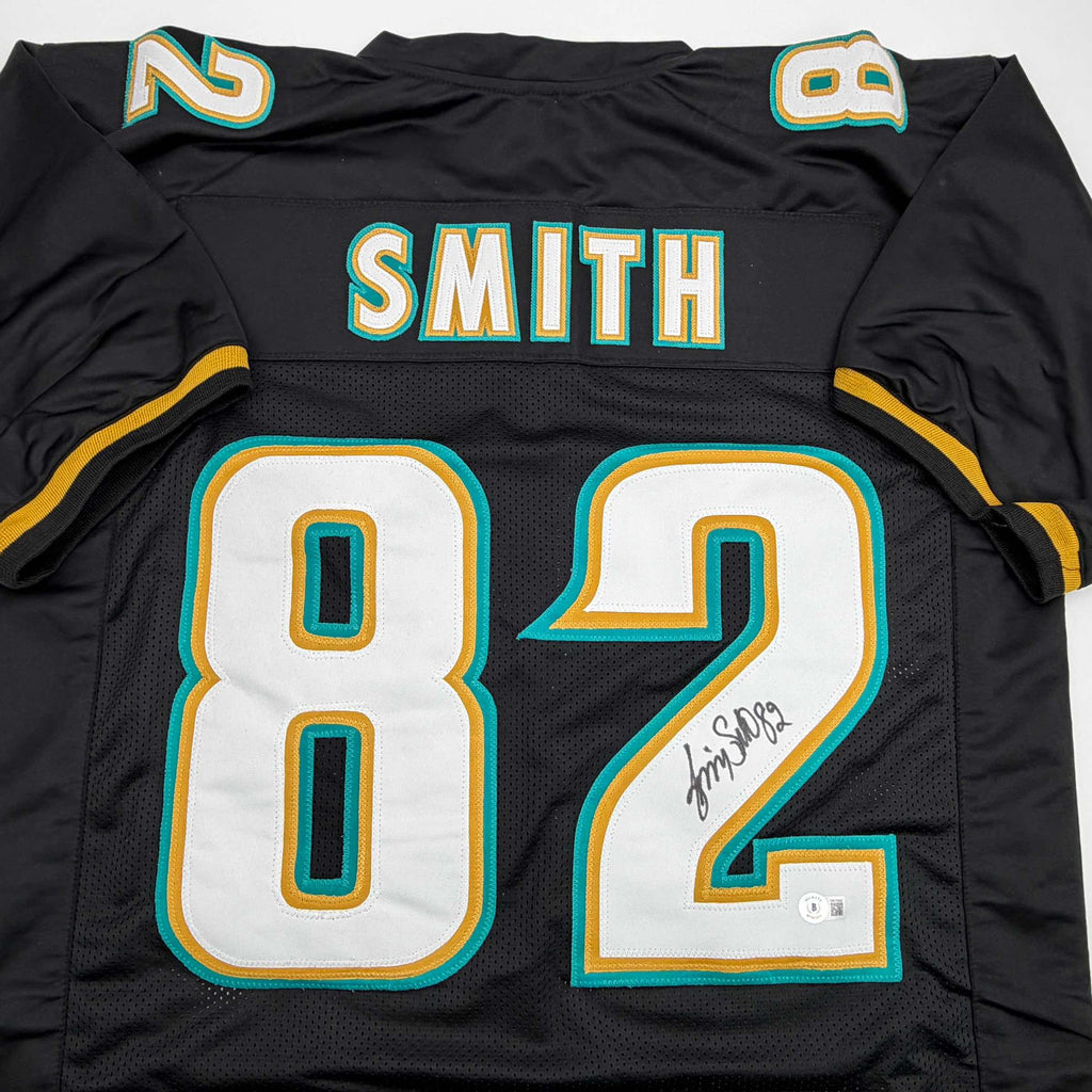 autographed-signed-jimmy-smith-jacksonville-black-football-jersey-beckett-bas-coa