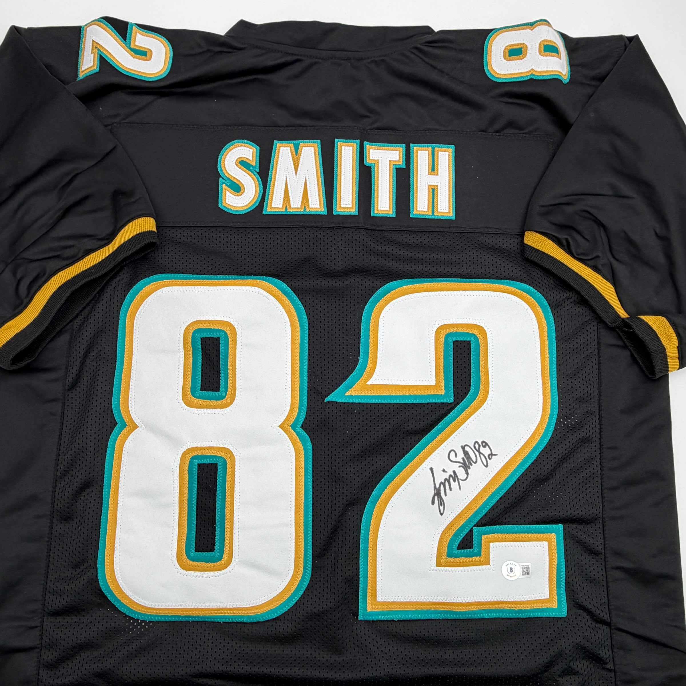 autographed-signed-jimmy-smith-jacksonville-black-football-jersey-beckett-bas-coa
