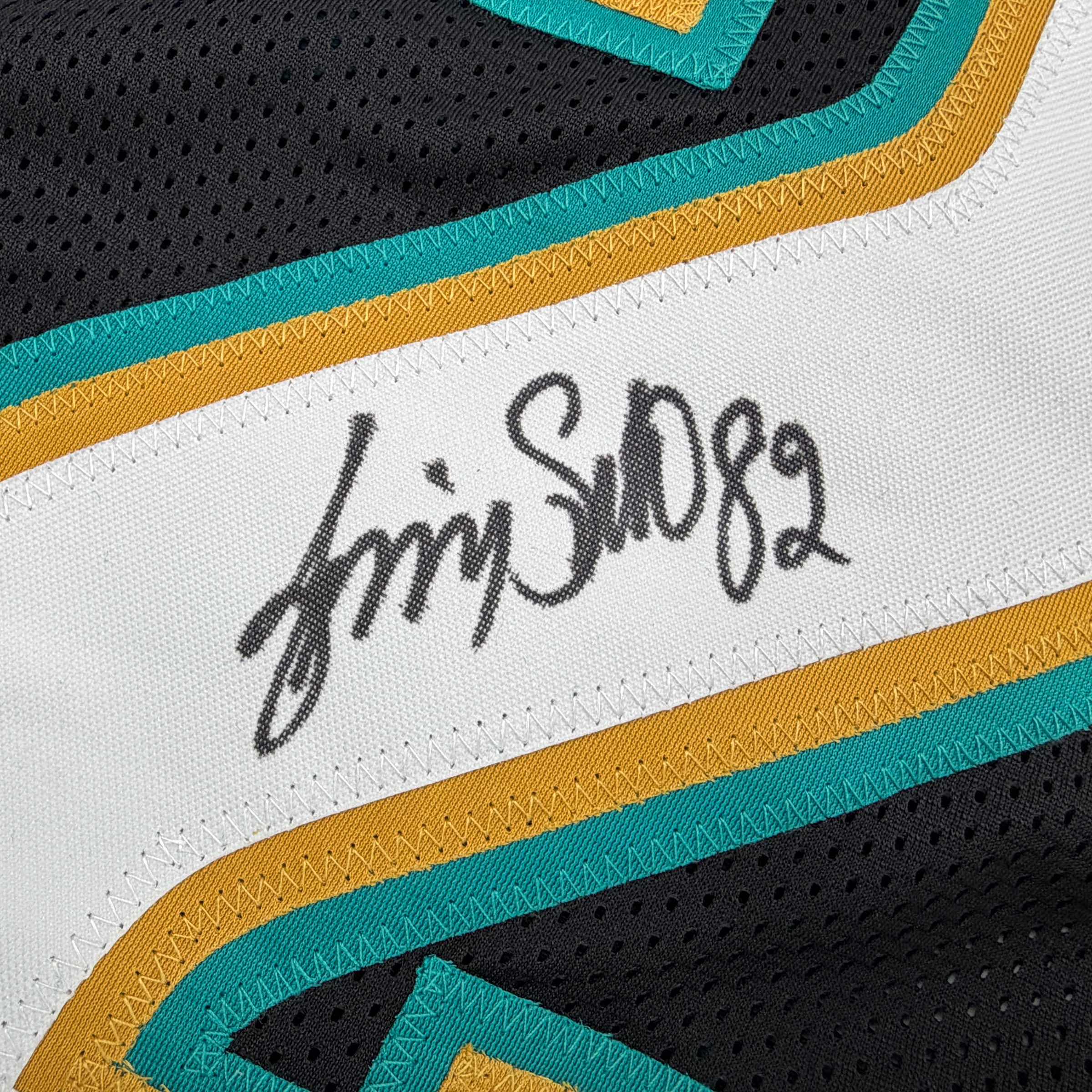 autographed-signed-jimmy-smith-jacksonville-black-football-jersey-beckett-bas-coa