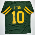 autographed-signed-jordan-love-green-bay-color-rush-football-jersey-beckett-bas-coa