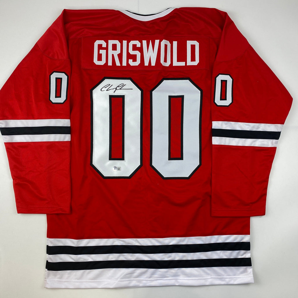 autographed-signed-chevy-chase-clark-griswold-christmas-vacation-movie-chicago-red-hockey-jersey-beckett-bas-coa
