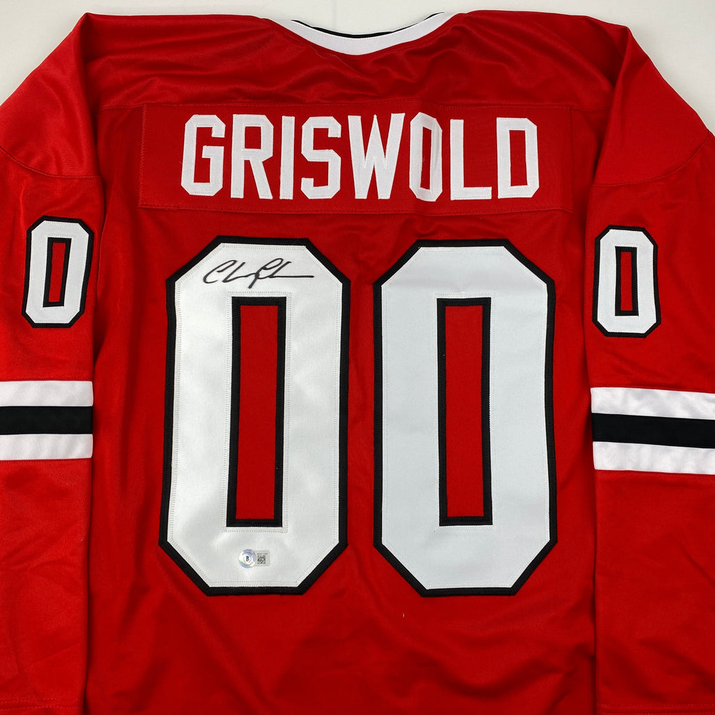 autographed-signed-chevy-chase-clark-griswold-christmas-vacation-movie-chicago-red-hockey-jersey-beckett-bas-coa