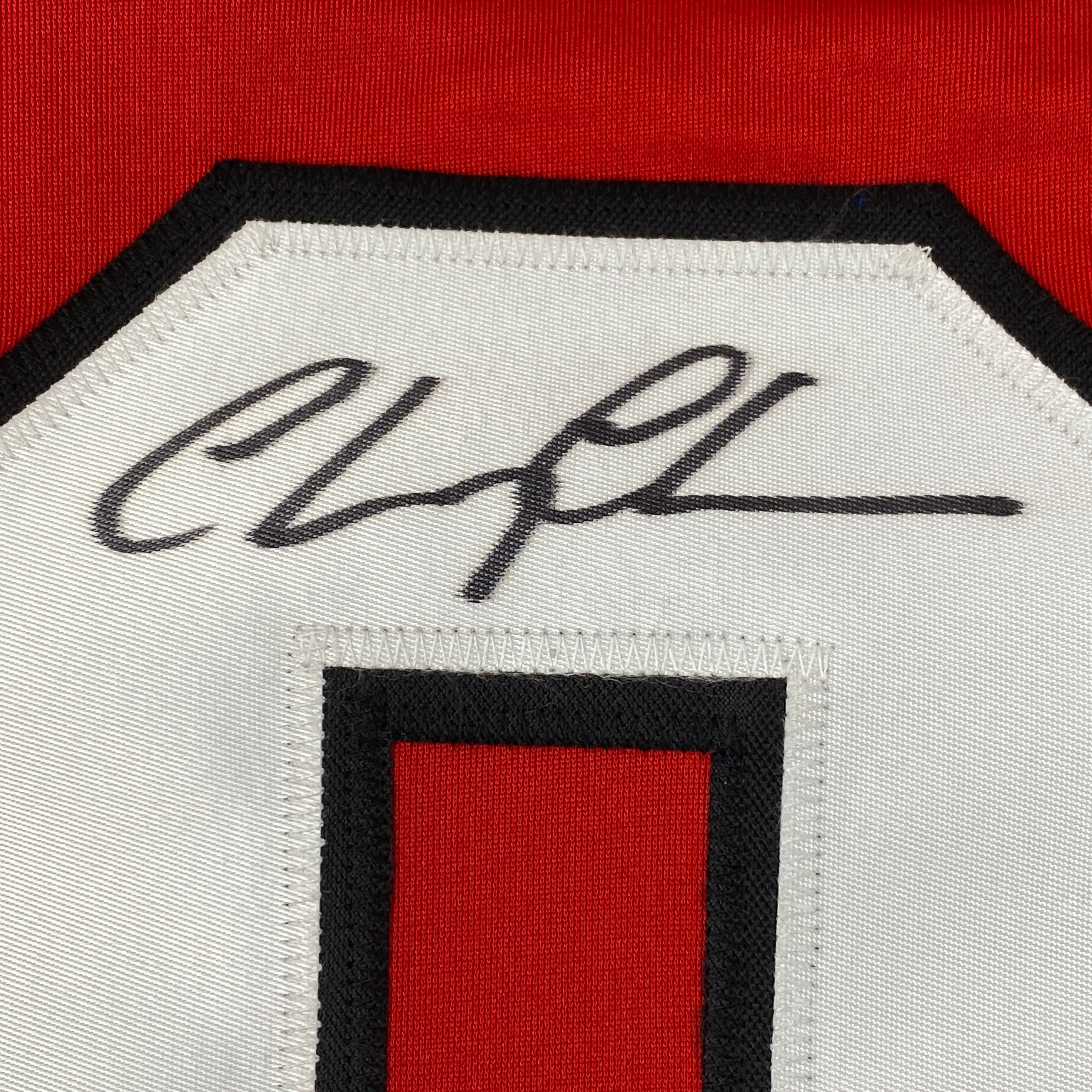 autographed-signed-chevy-chase-clark-griswold-christmas-vacation-movie-chicago-red-hockey-jersey-beckett-bas-coa