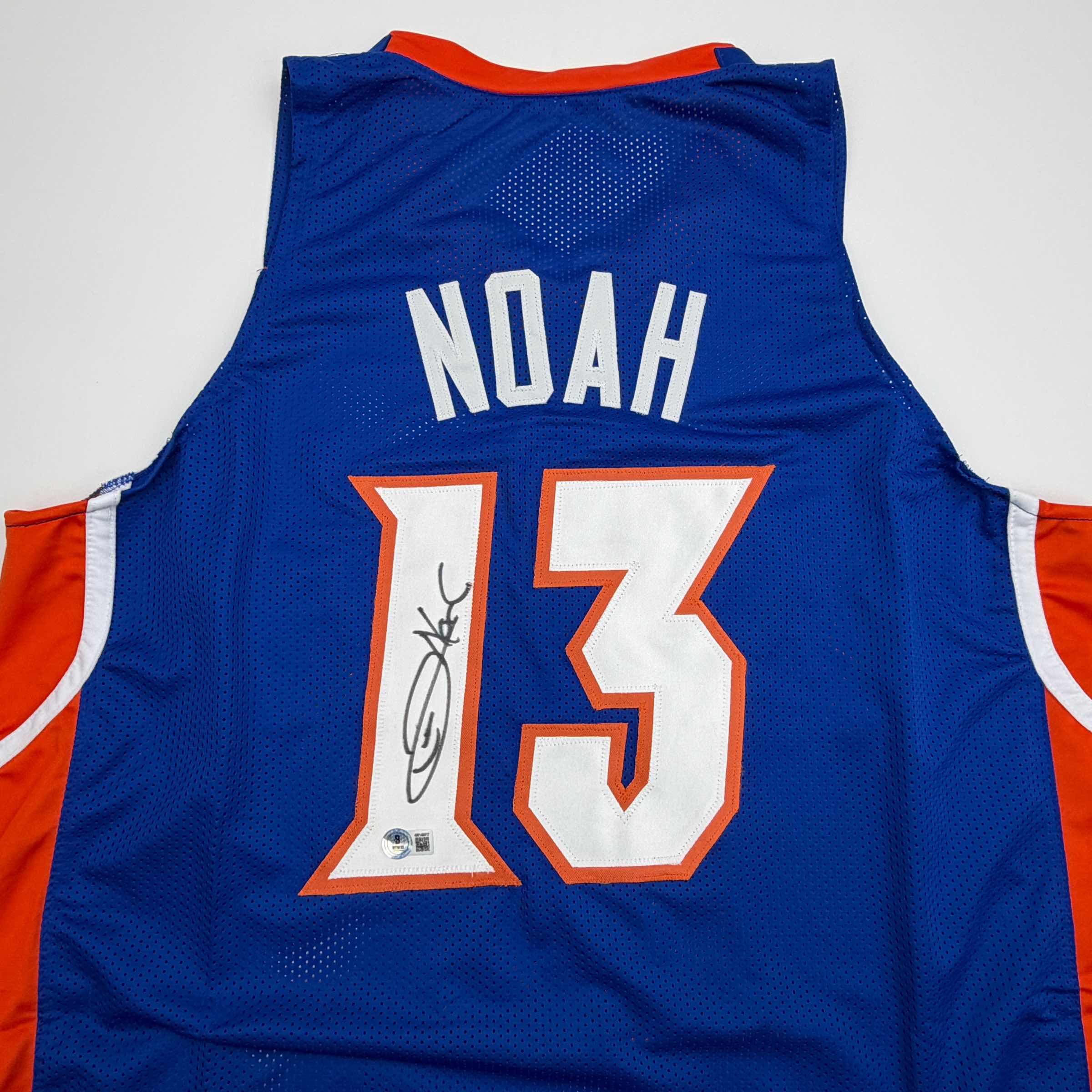 autographed-signed-joakim-noah-florida-blue-college-basketball-jersey-beckett-bas-coa