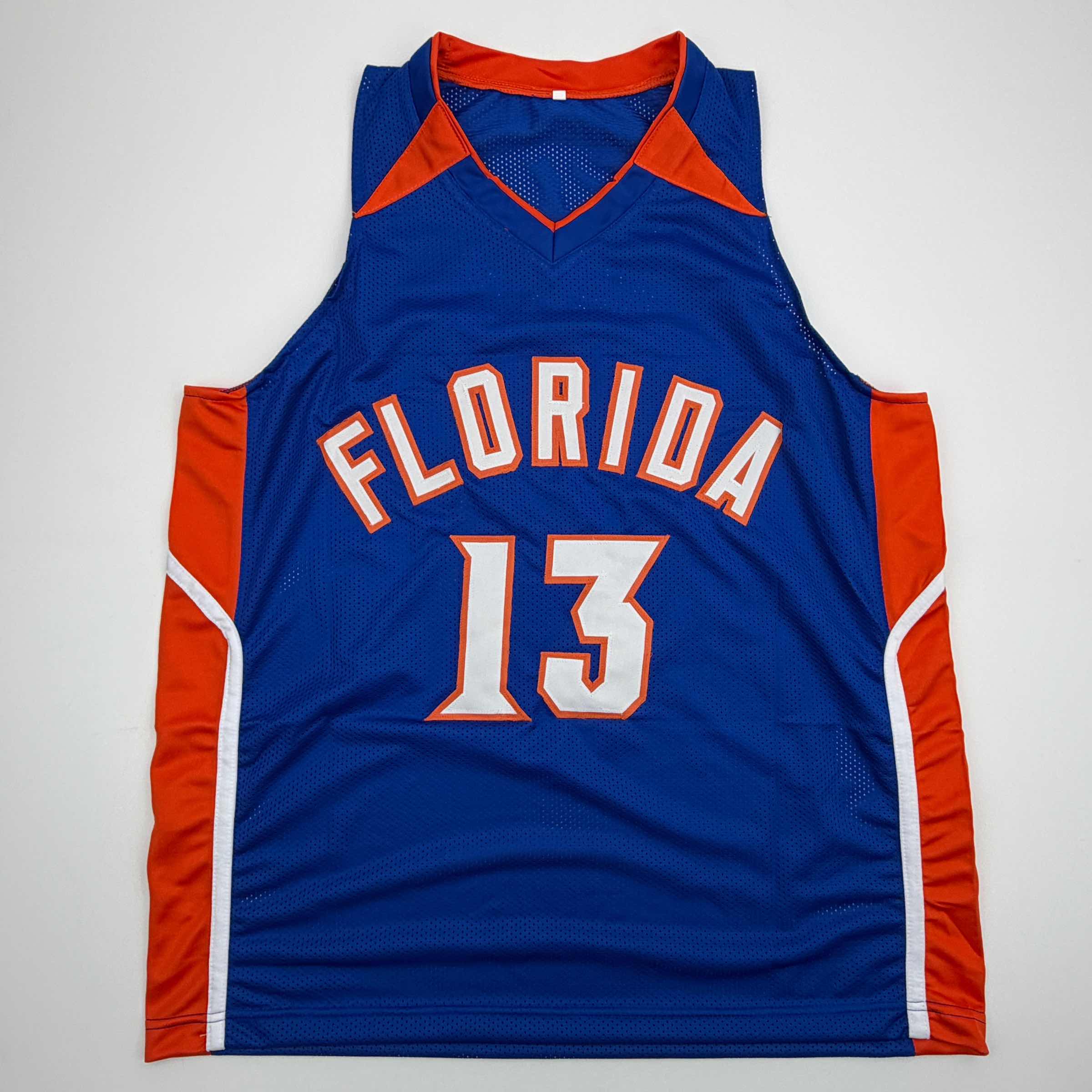 autographed-signed-joakim-noah-florida-blue-college-basketball-jersey-beckett-bas-coa