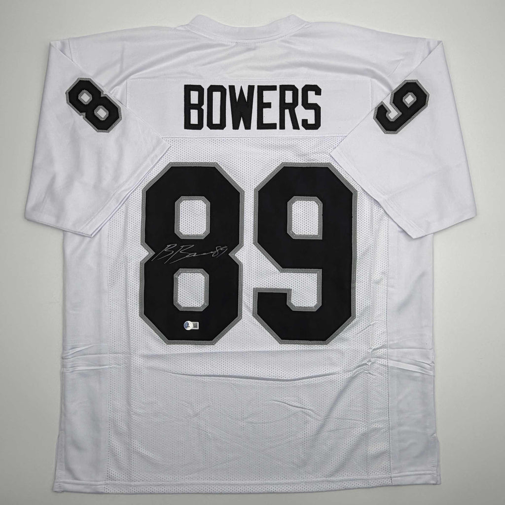 autographed-signed-brock-bowers-las-vegas-oakland-white-football-jersey-beckett-bas-coa
