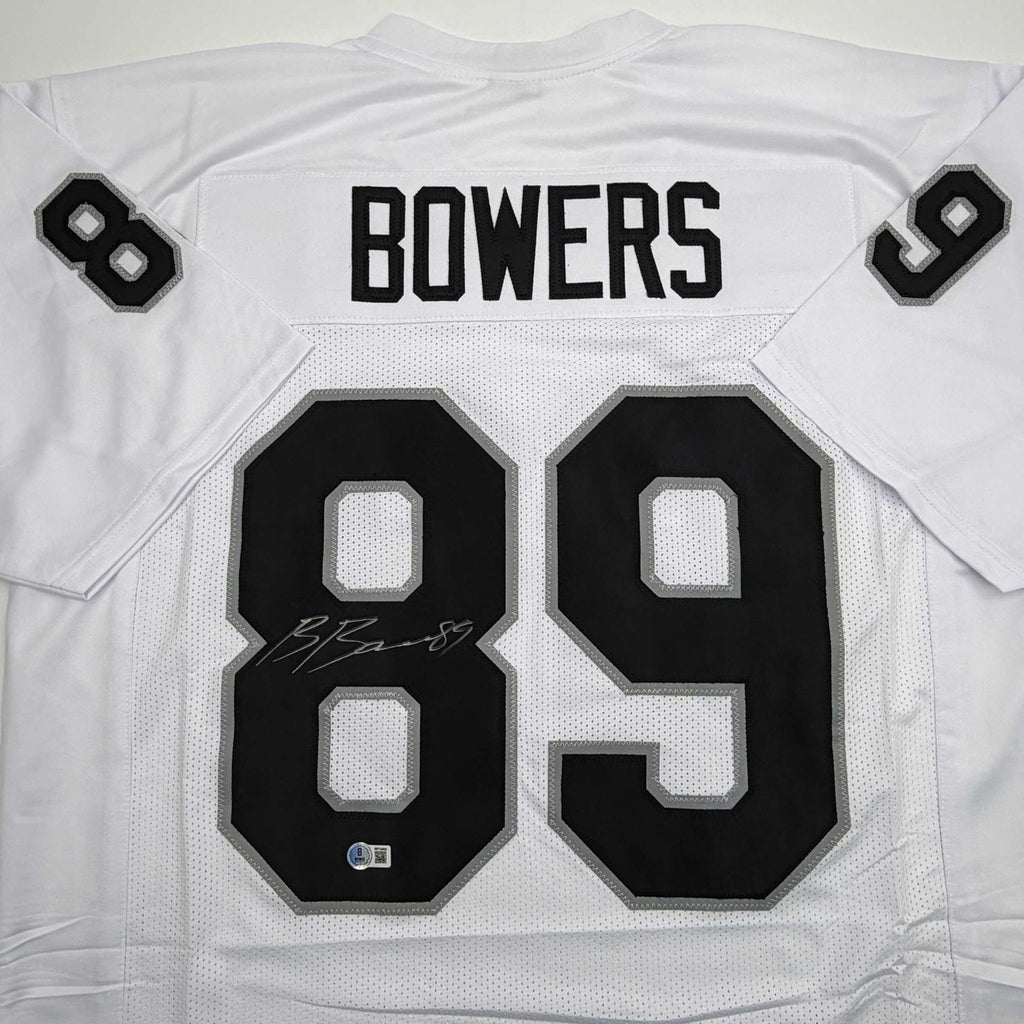 autographed-signed-brock-bowers-las-vegas-oakland-white-football-jersey-beckett-bas-coa