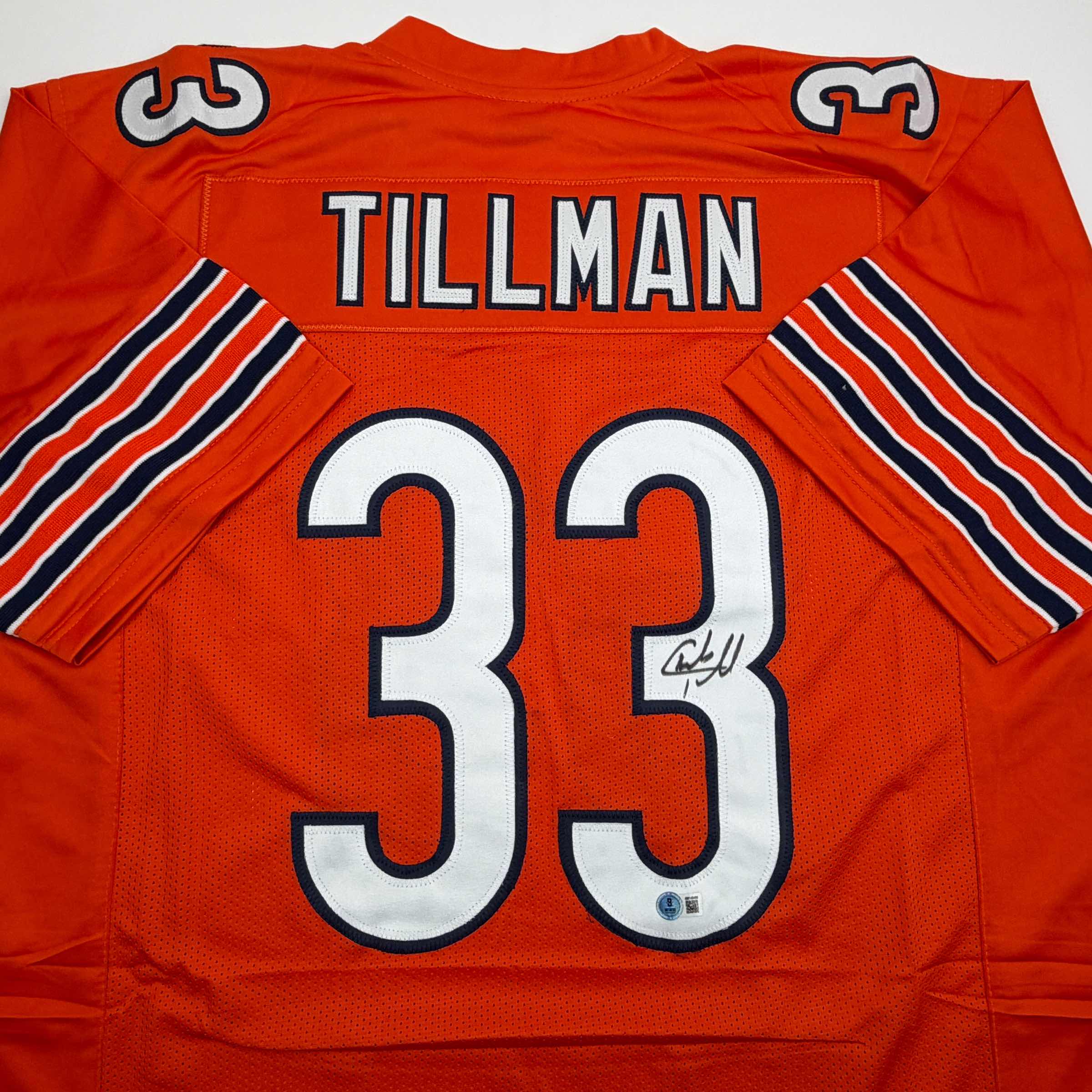 autographed-signed-charles-tillman-peanut-chicago-orange-football-jersey-beckett-bas-coa