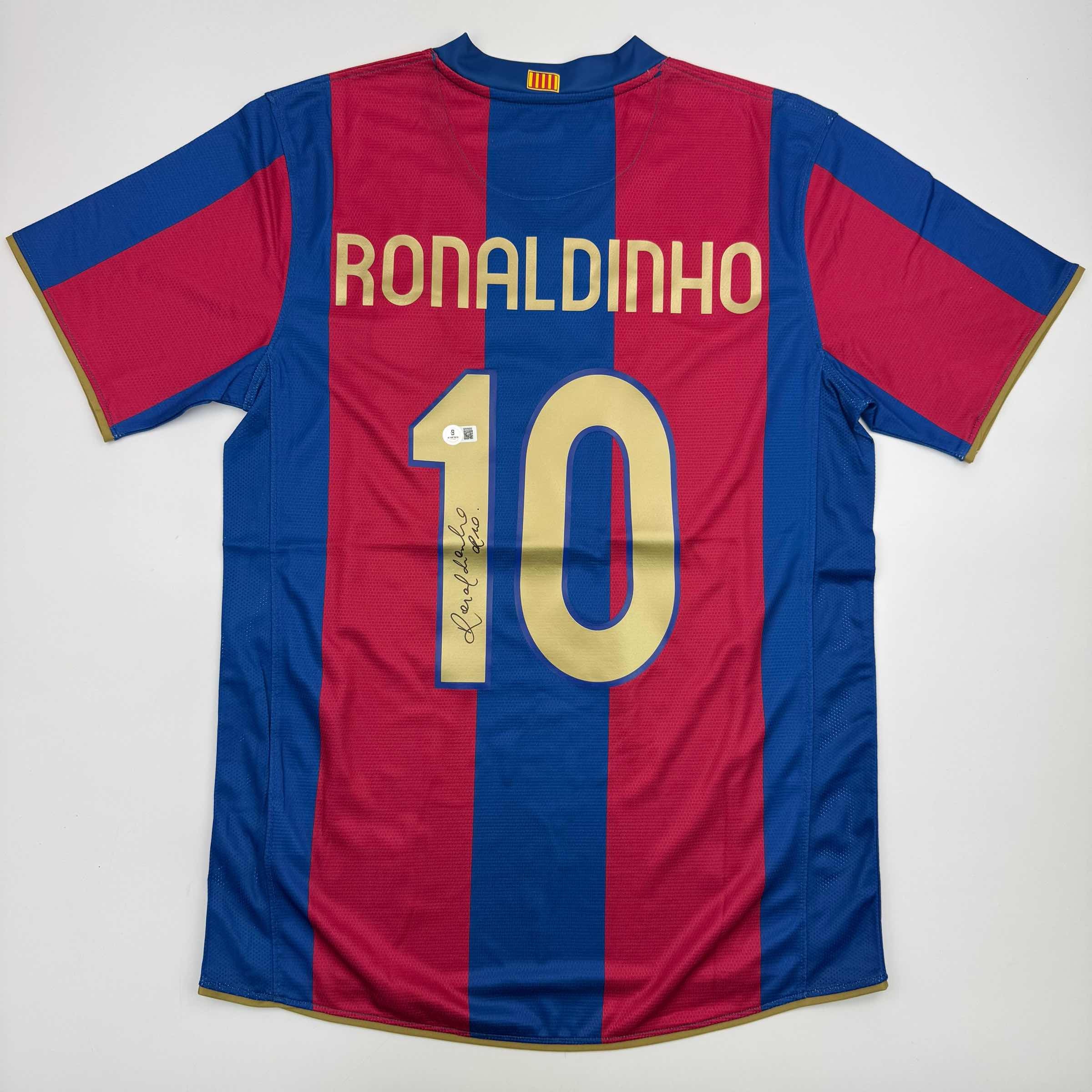 autographed-signed-ronaldinho-barcelona-blue-red-soccer-jersey-beckett-bas-coa-1