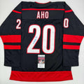 autographed-signed-sebastian-aho-carolina-black-hockey-jersey-jsa-coa