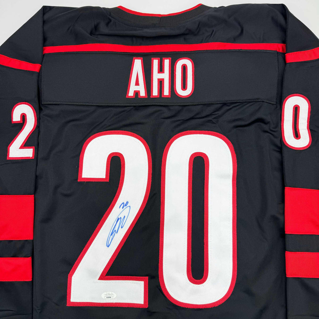 autographed-signed-sebastian-aho-carolina-black-hockey-jersey-jsa-coa