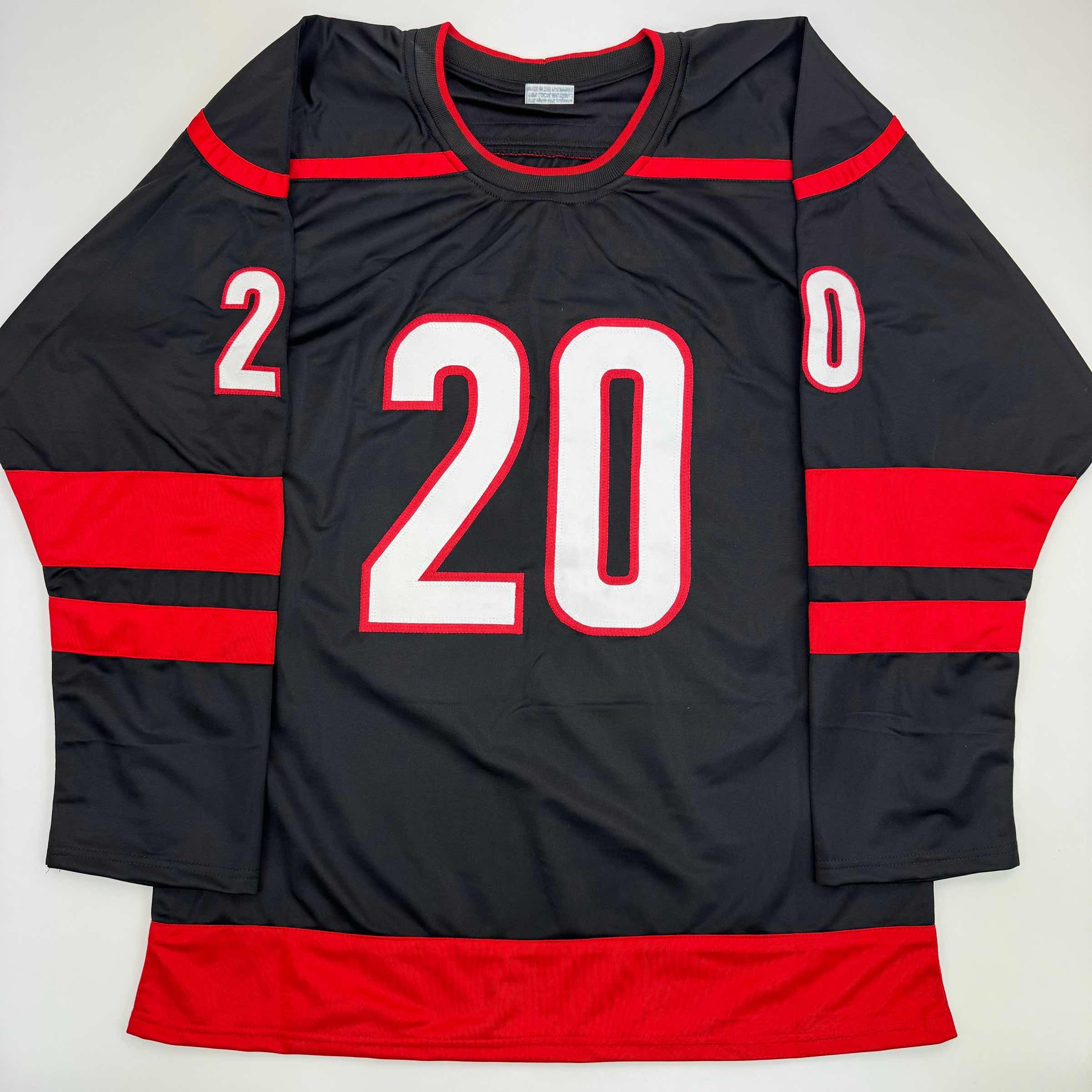autographed-signed-sebastian-aho-carolina-black-hockey-jersey-jsa-coa