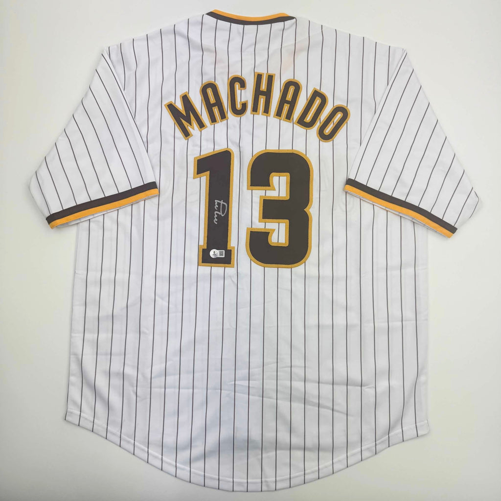 autographed-signed-manny-machado-san-diego-pinstripe-baseball-jersey-beckett-bas-coa
