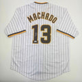 autographed-signed-manny-machado-san-diego-pinstripe-baseball-jersey-beckett-bas-coa