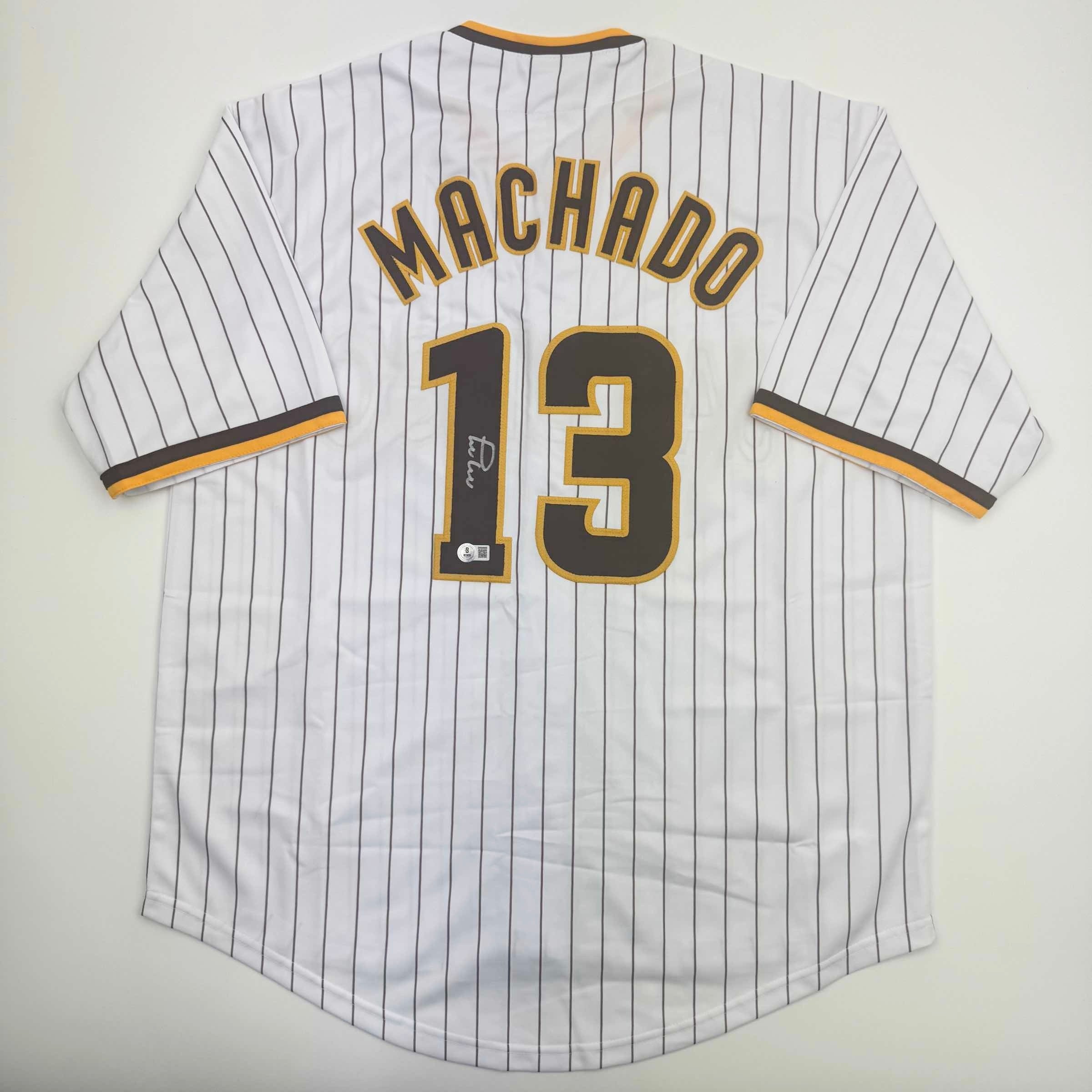 autographed-signed-manny-machado-san-diego-pinstripe-baseball-jersey-beckett-bas-coa