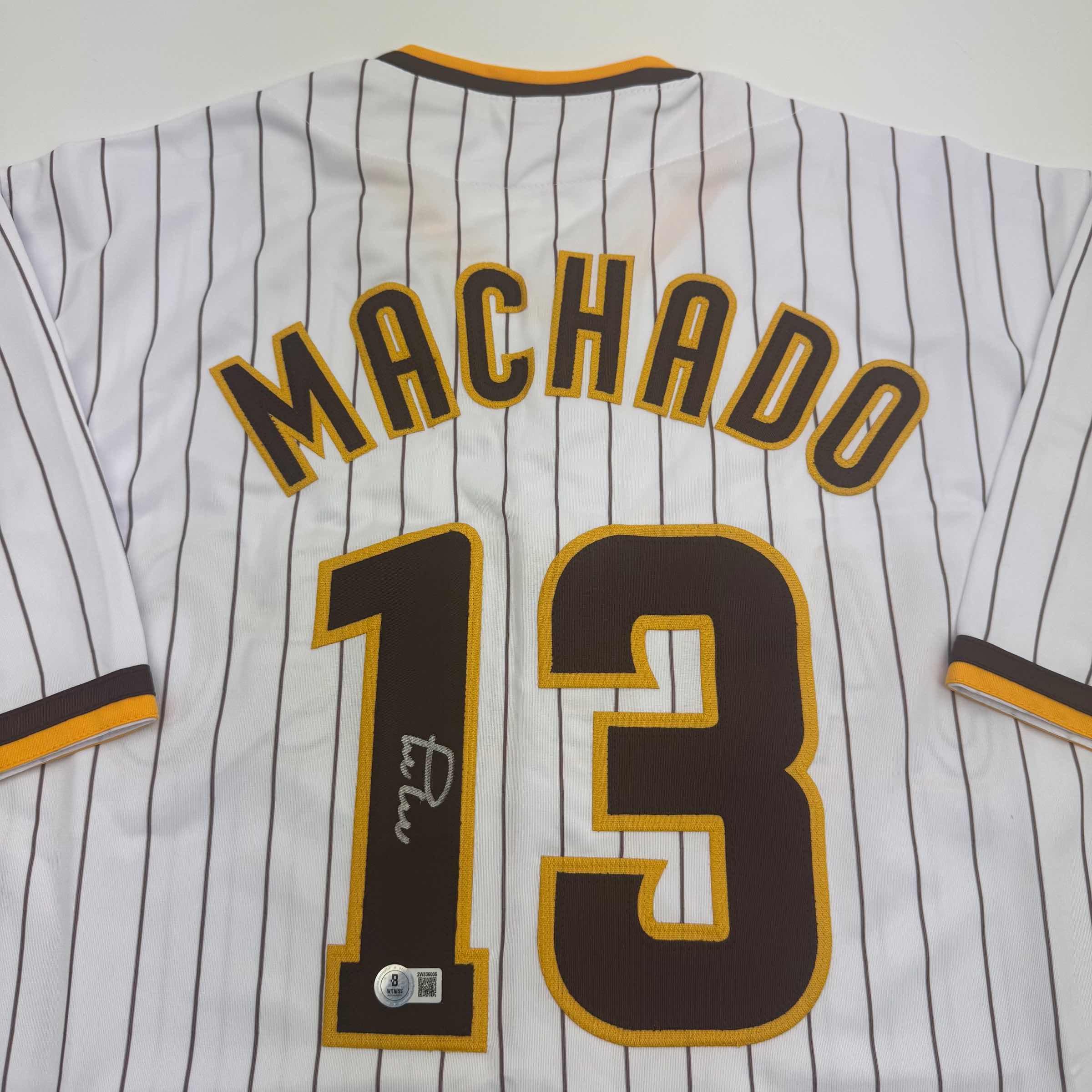 autographed-signed-manny-machado-san-diego-pinstripe-baseball-jersey-beckett-bas-coa