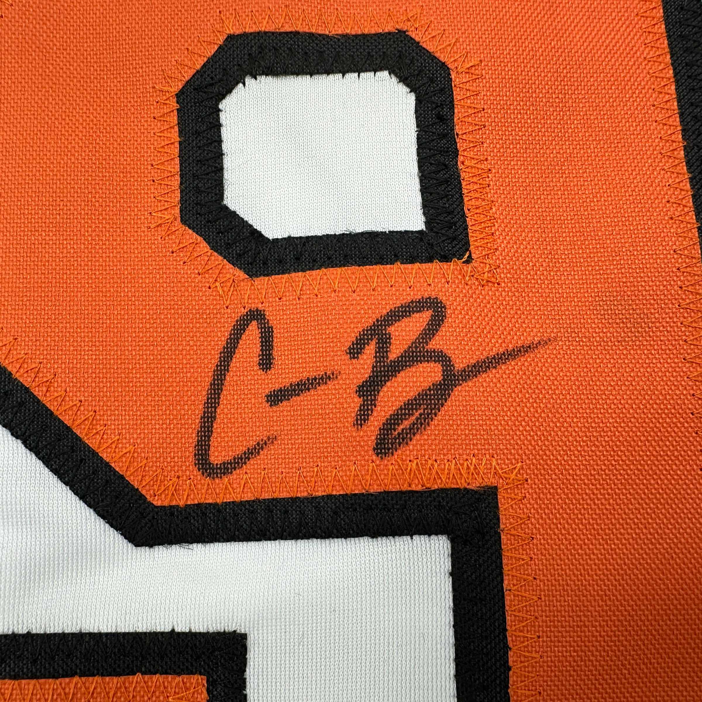 autographed-signed-corbin-burnes-baltimore-white-baseball-jersey-beckett-bas-coa