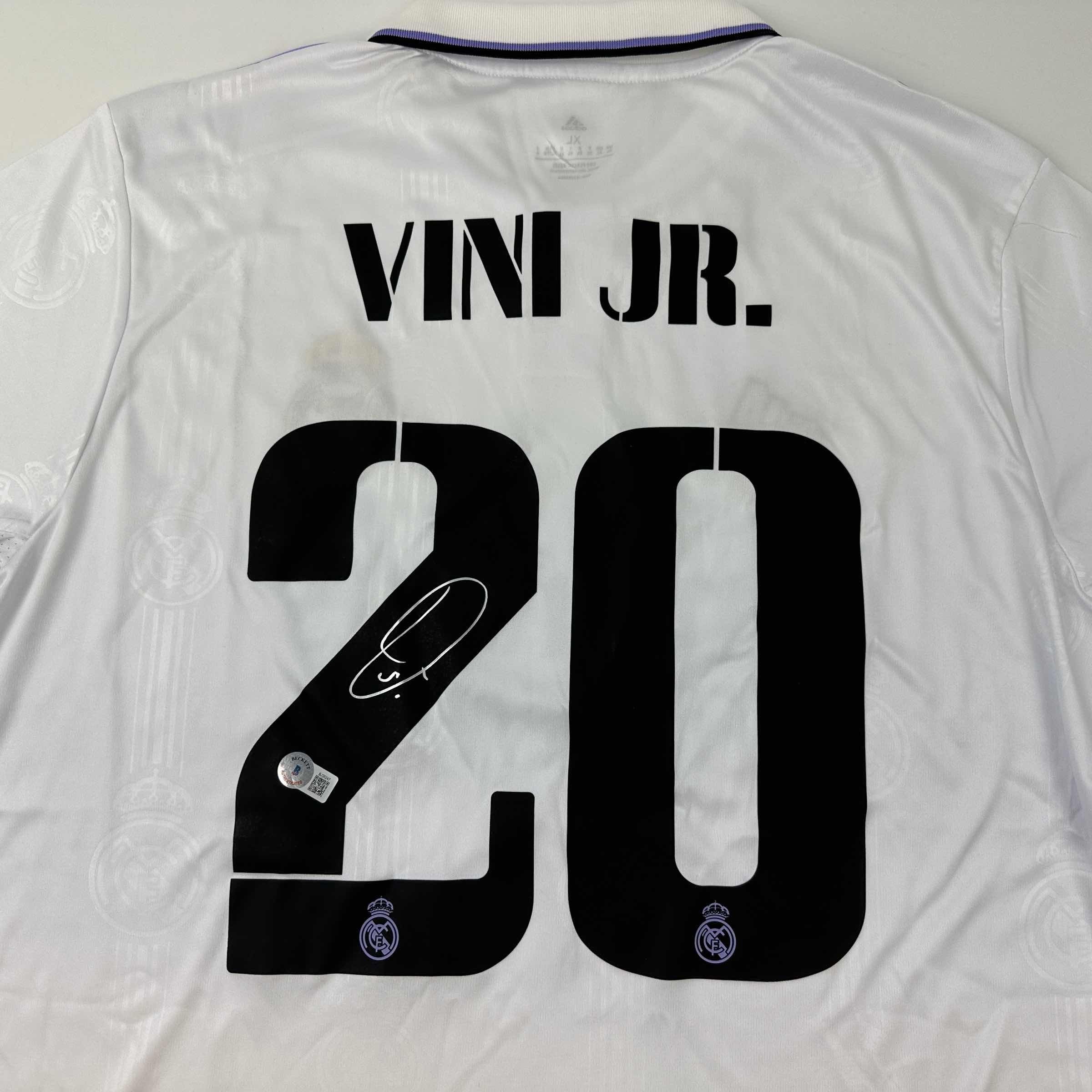 autographed-signed-vini-vinicius-jr-real-madrid-2022-23-white-soccer-jersey-beckett-bas-coa
