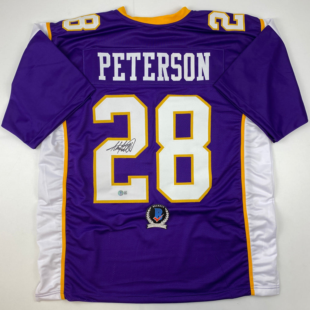 autographed-signed-adrian-peterson-minnesota-purple-football-jersey-beckett-bas-coa