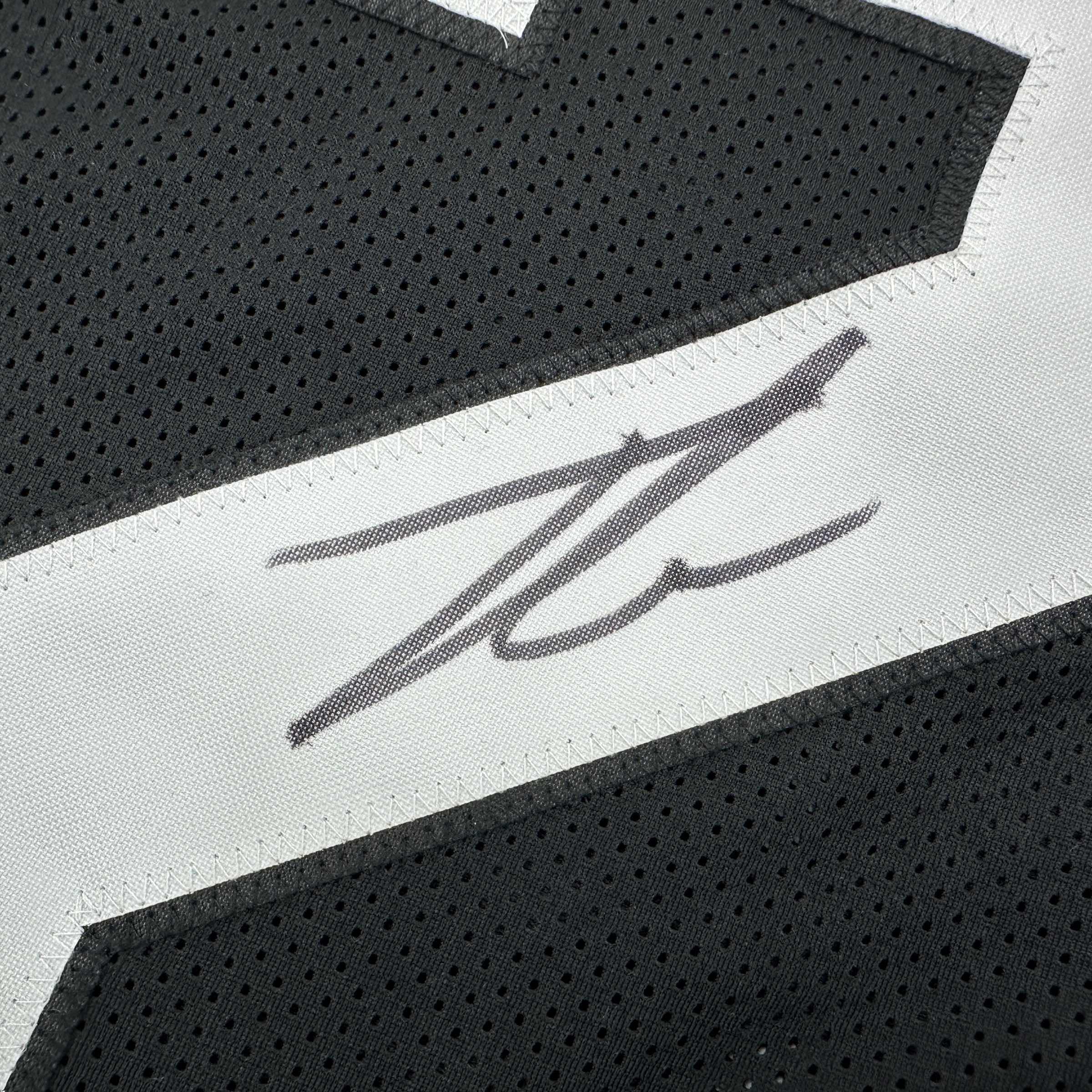 autographed-signed-tyson-campbell-jacksonville-black-football-jersey-jsa-coa