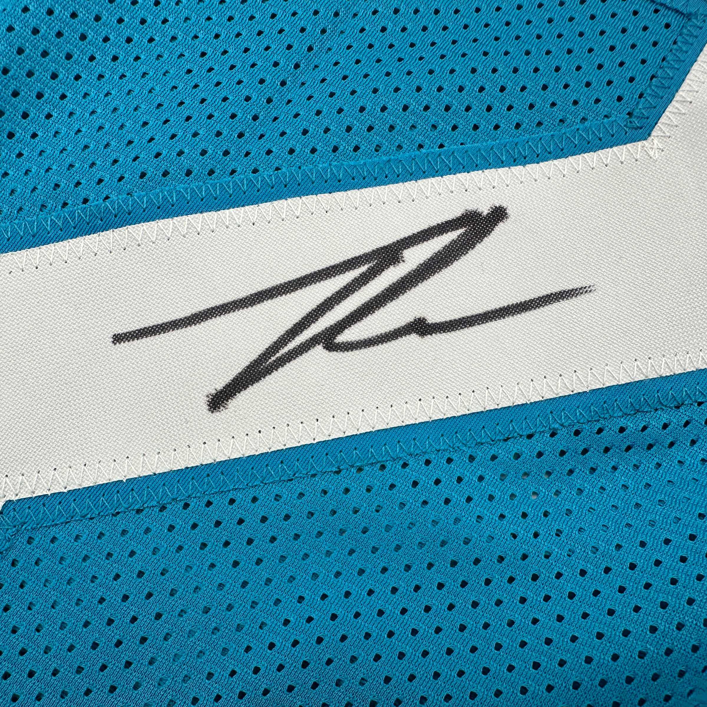 autographed-signed-tyson-campbell-jacksonville-teal-football-jersey-jsa-coa