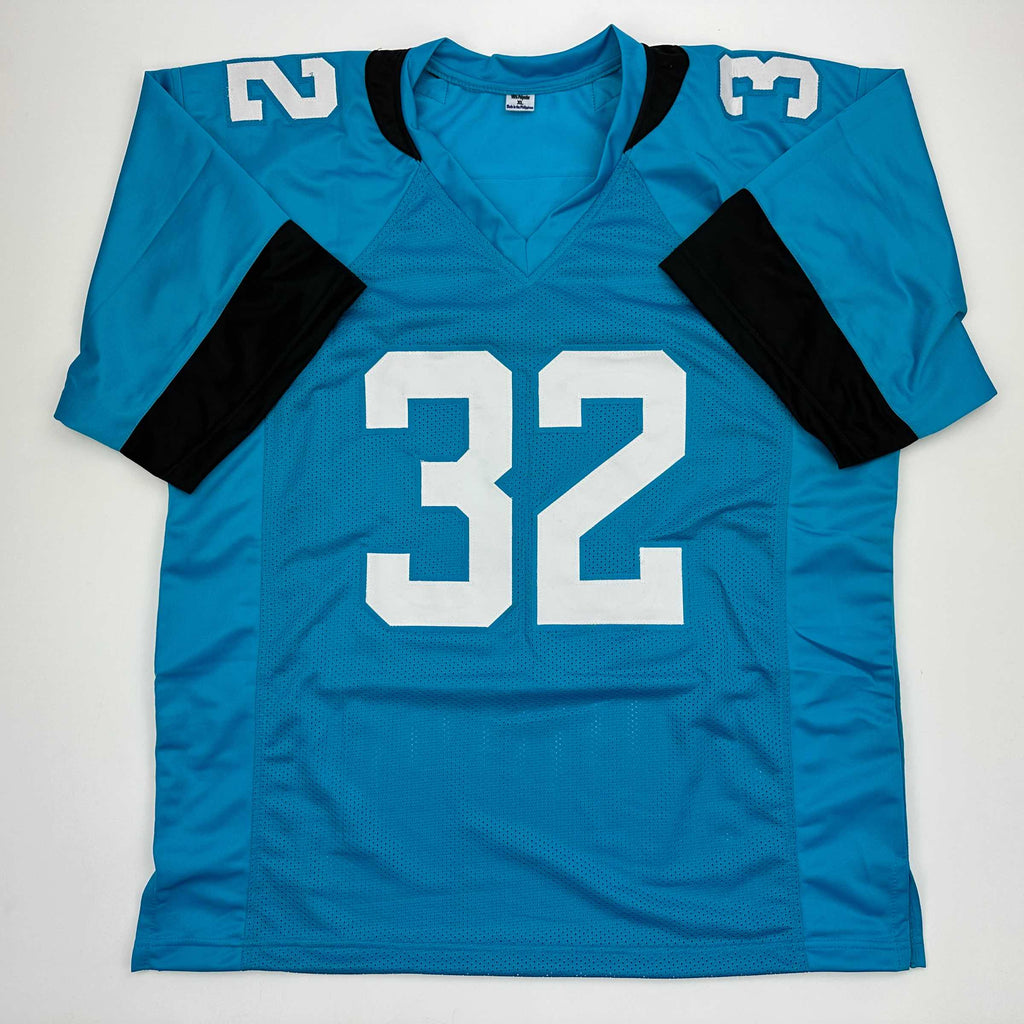 autographed-signed-tyson-campbell-jacksonville-teal-football-jersey-jsa-coa