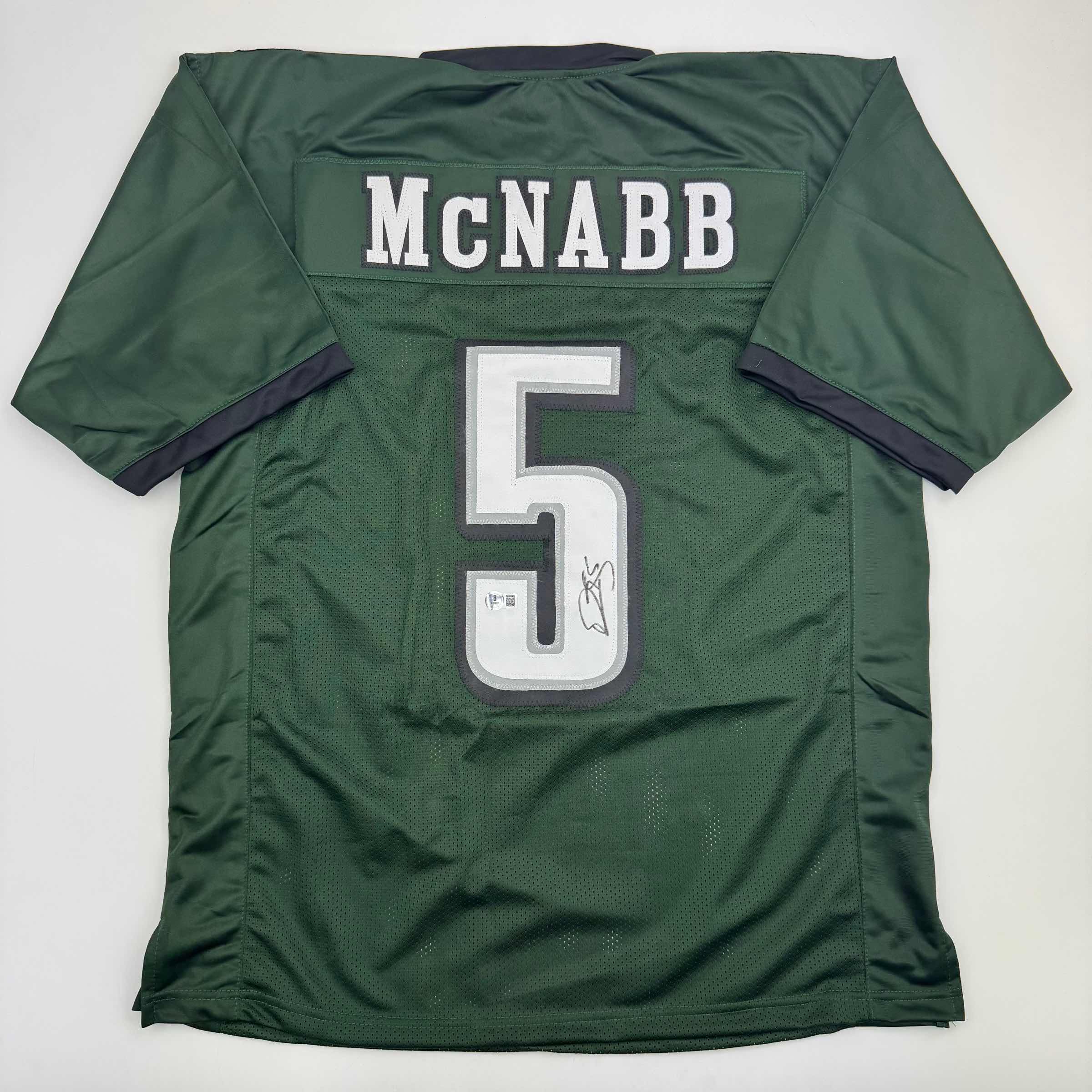 autographed-signed-donovan-mcnabb-philadelphia-green-football-jersey-beckett-bas-coa