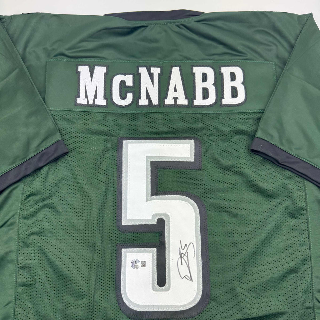 autographed-signed-donovan-mcnabb-philadelphia-green-football-jersey-beckett-bas-coa