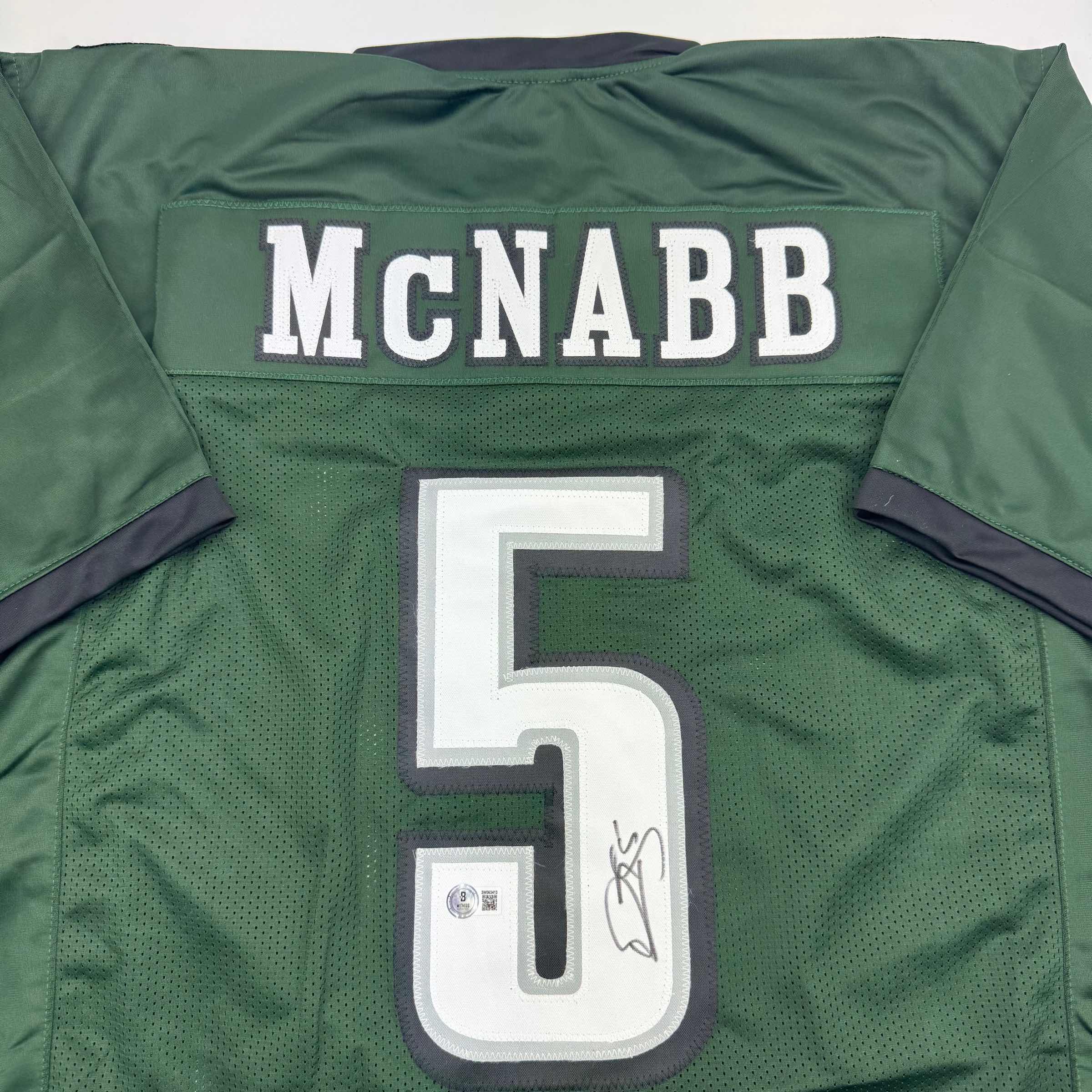 autographed-signed-donovan-mcnabb-philadelphia-green-football-jersey-beckett-bas-coa