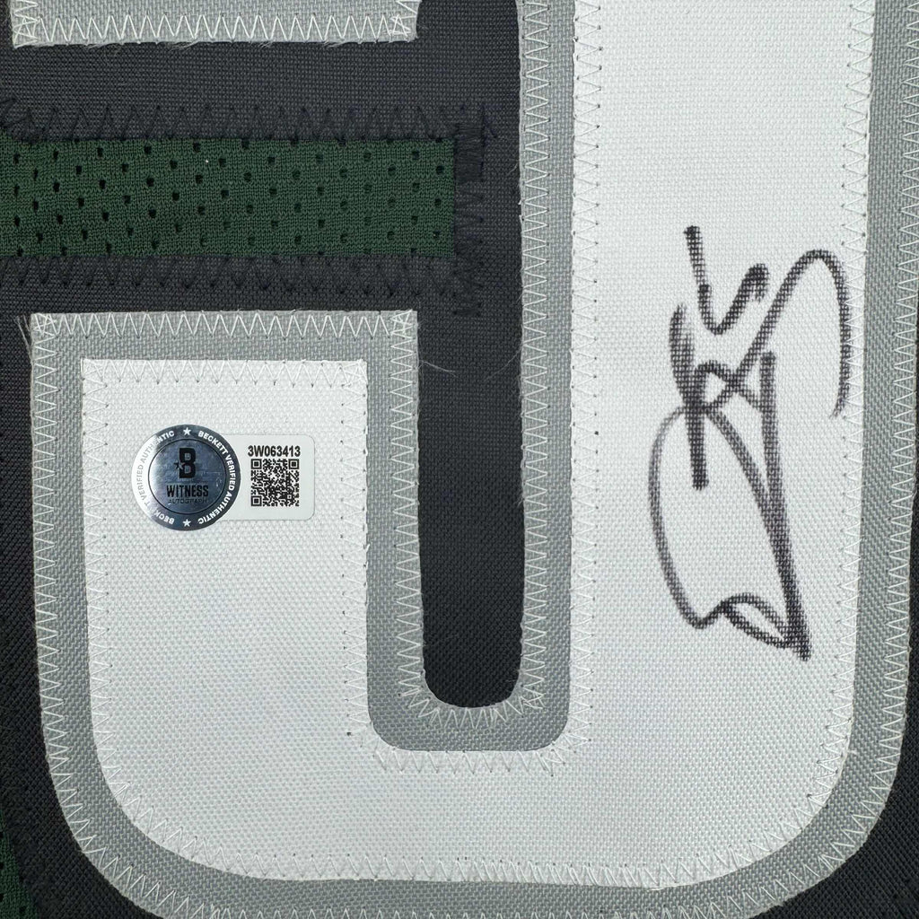 autographed-signed-donovan-mcnabb-philadelphia-green-football-jersey-beckett-bas-coa