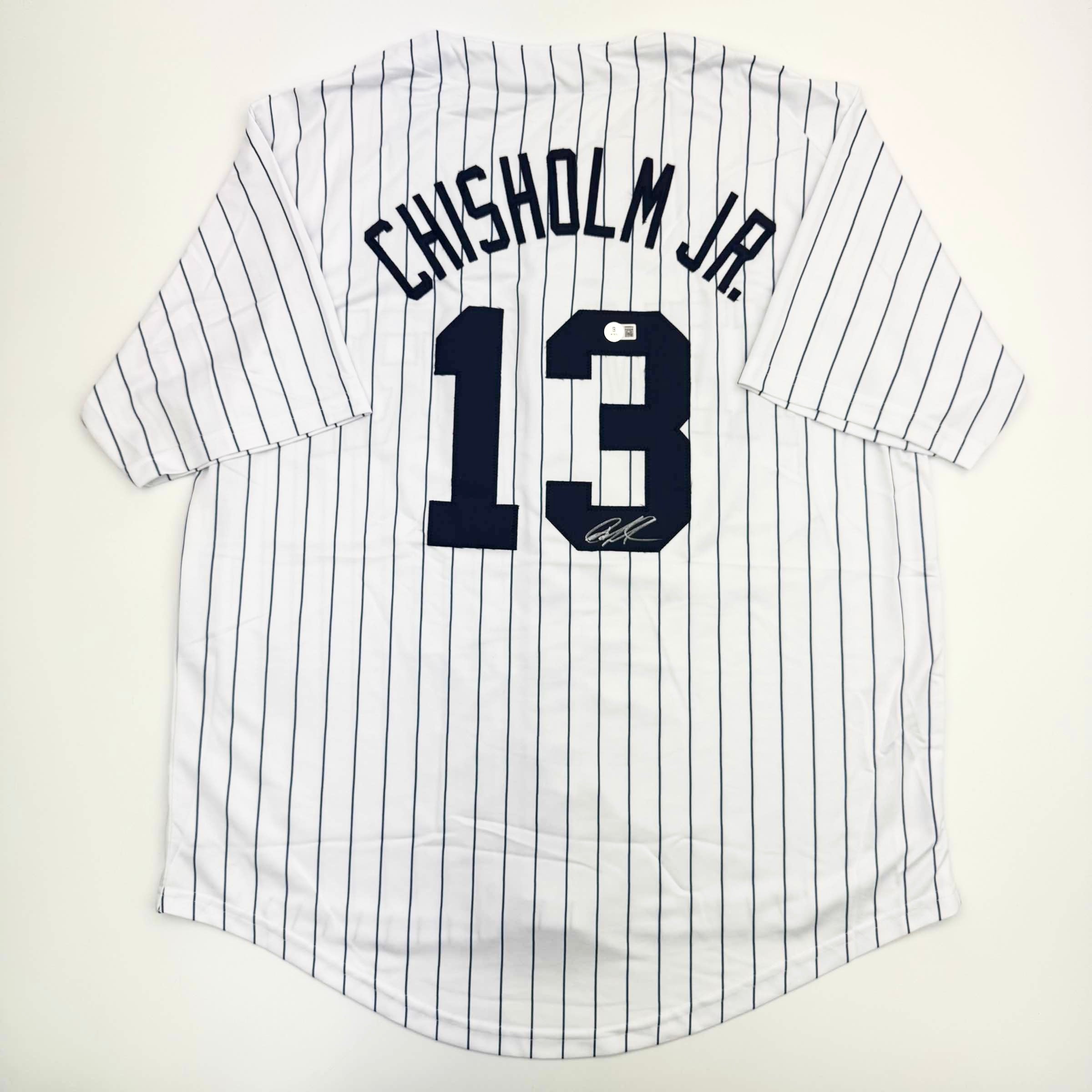 autographed-signed-jazz-chisholm-jr-new-york-pinstripe-baseball-jersey-beckett-bas-coa