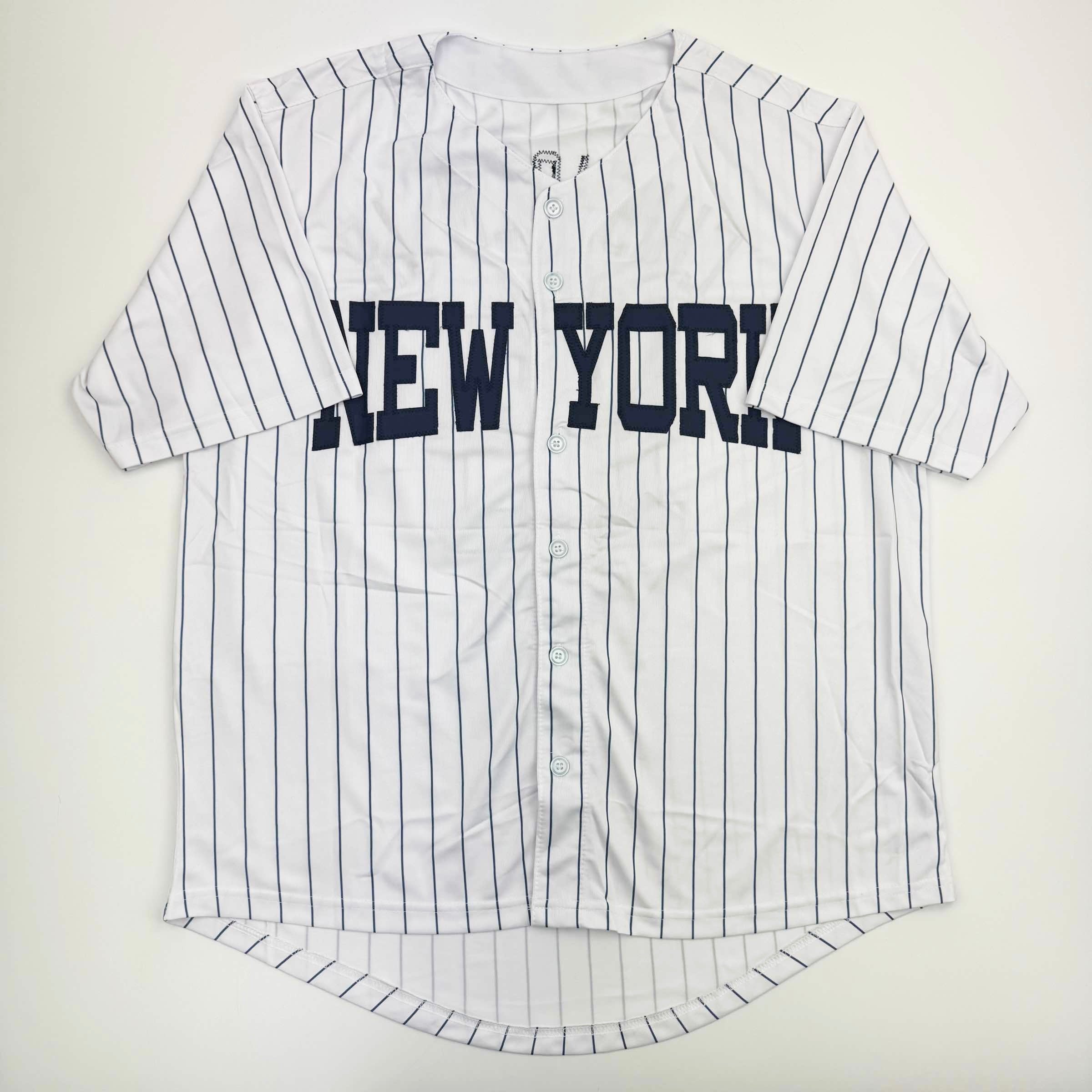 autographed-signed-jazz-chisholm-jr-new-york-pinstripe-baseball-jersey-beckett-bas-coa