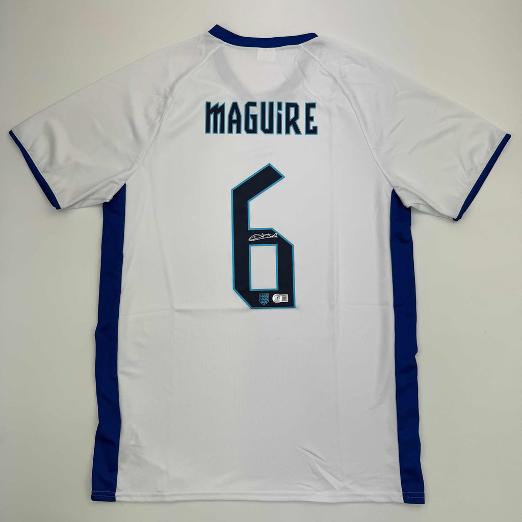 autographed-signed-harry-maguire-england-white-soccer-jersey-beckett-bas-coa