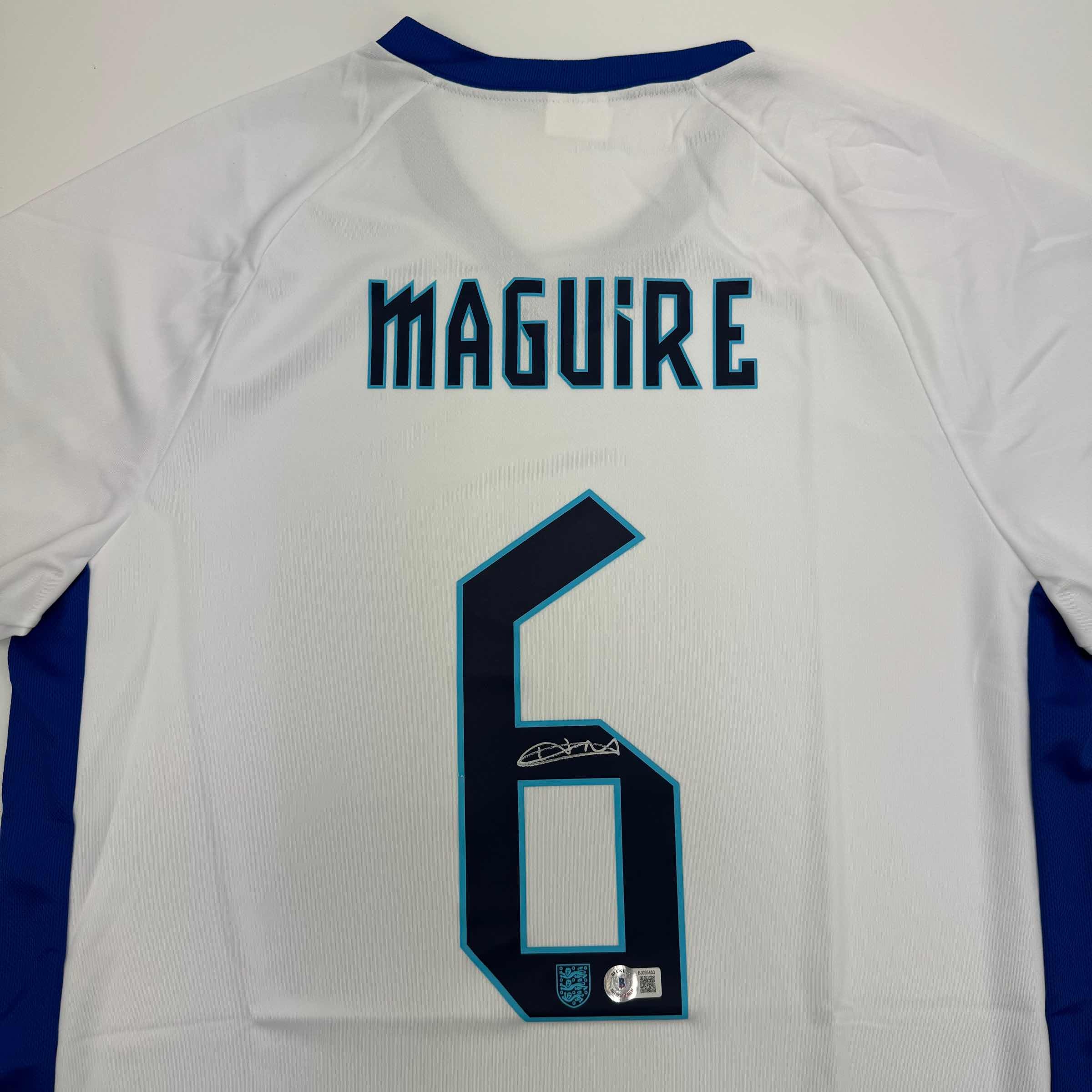 autographed-signed-harry-maguire-england-white-soccer-jersey-beckett-bas-coa