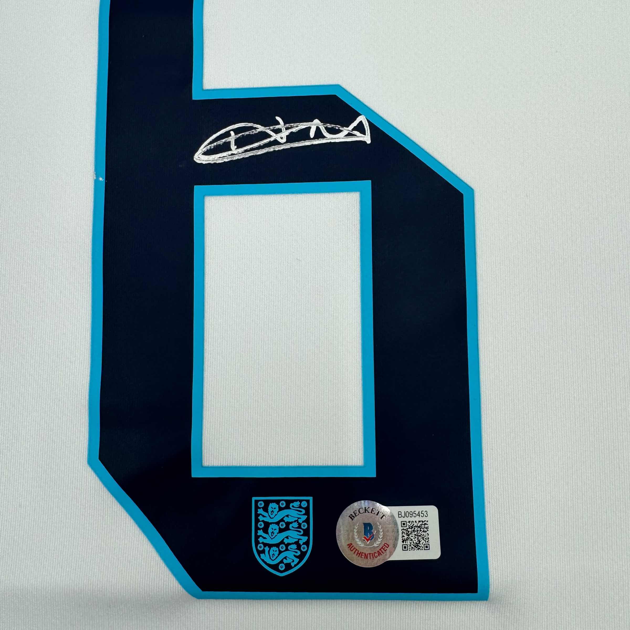 autographed-signed-harry-maguire-england-white-soccer-jersey-beckett-bas-coa
