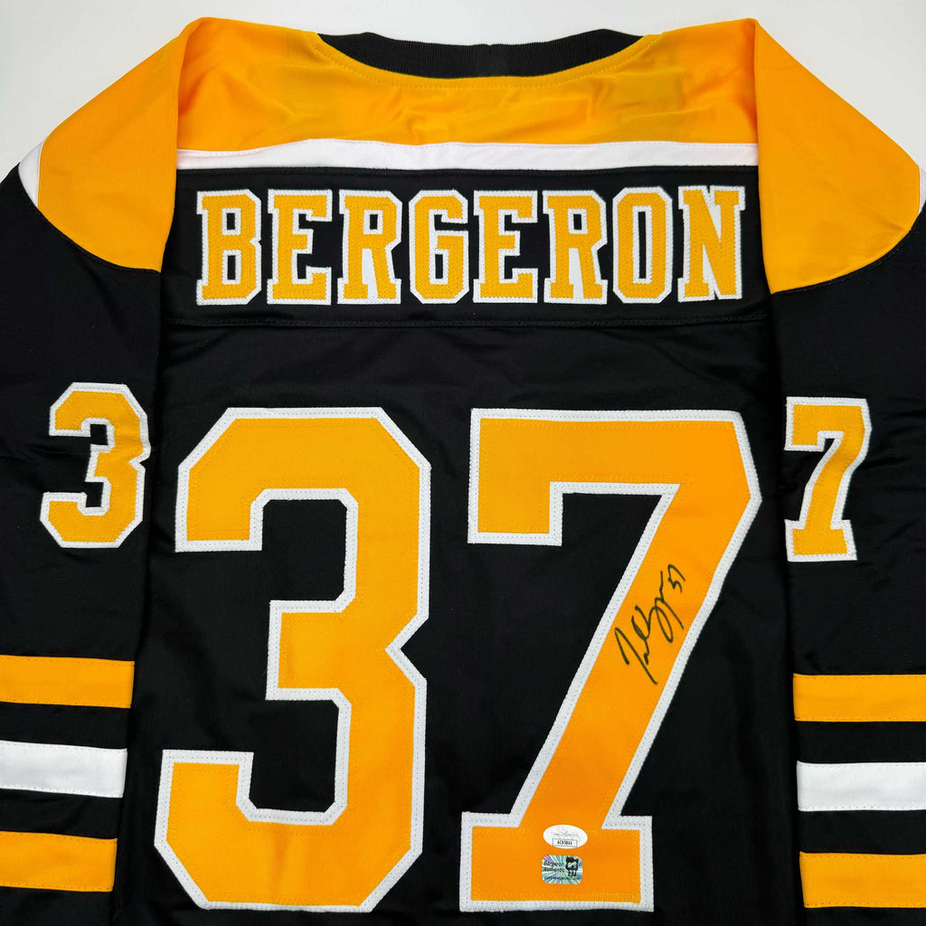 autographed-signed-patrice-bergeron-boston-black-hockey-jersey-jsa-coa