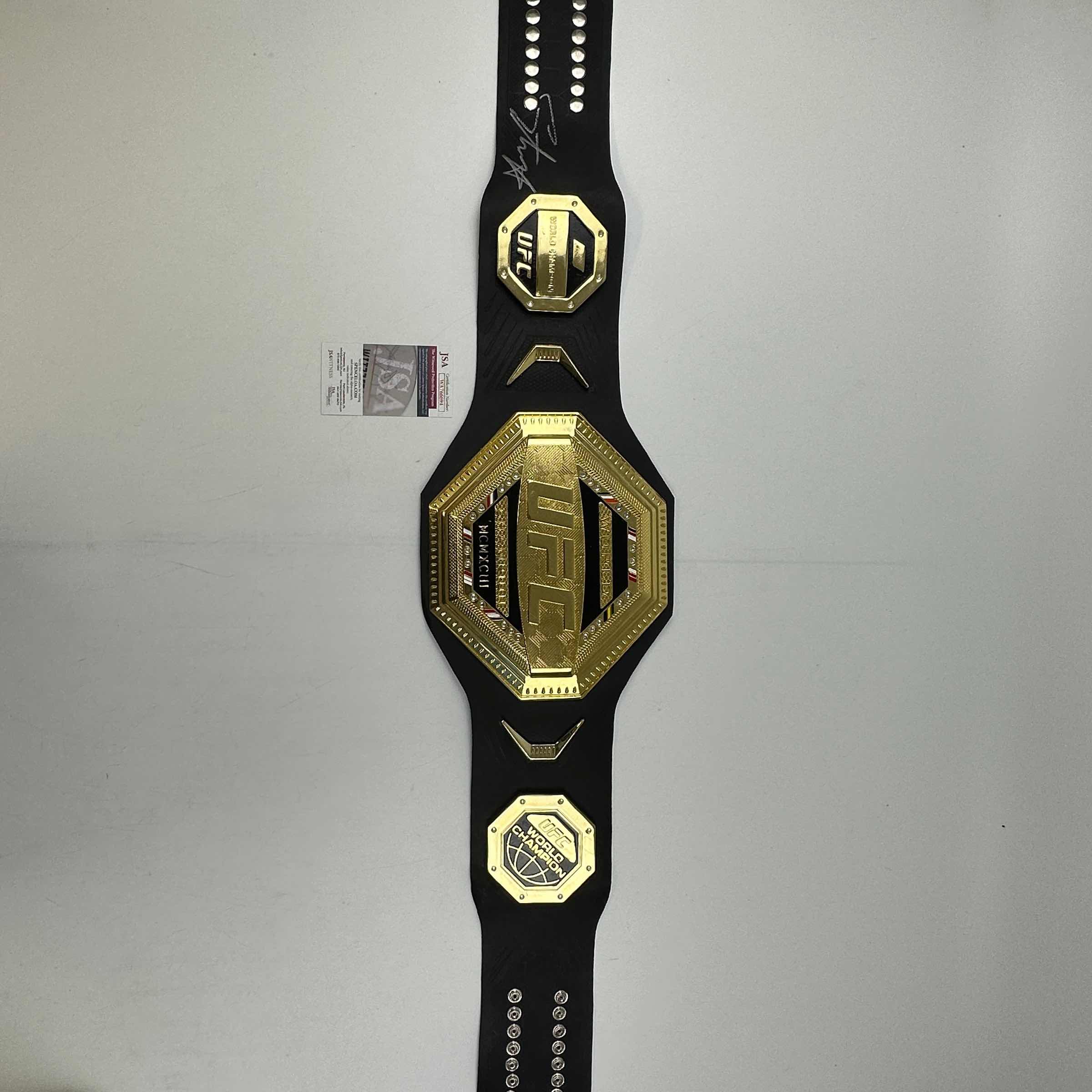 autographed-signed-israel-izzy-adesanya-black-replica-ufc-championship-title-belt-jsa-coa