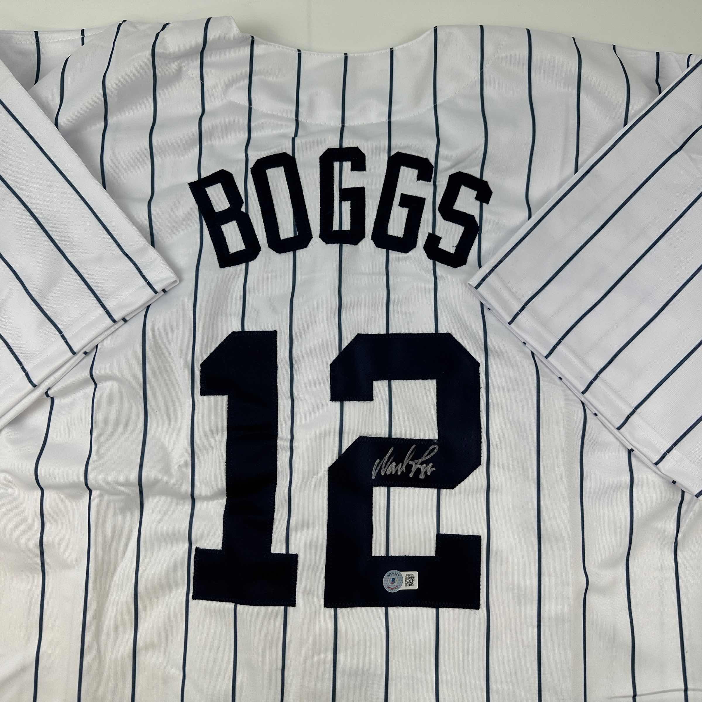 autographed-signed-wade-boggs-new-york-pinstripe-baseball-jersey-beckett-bas-coa