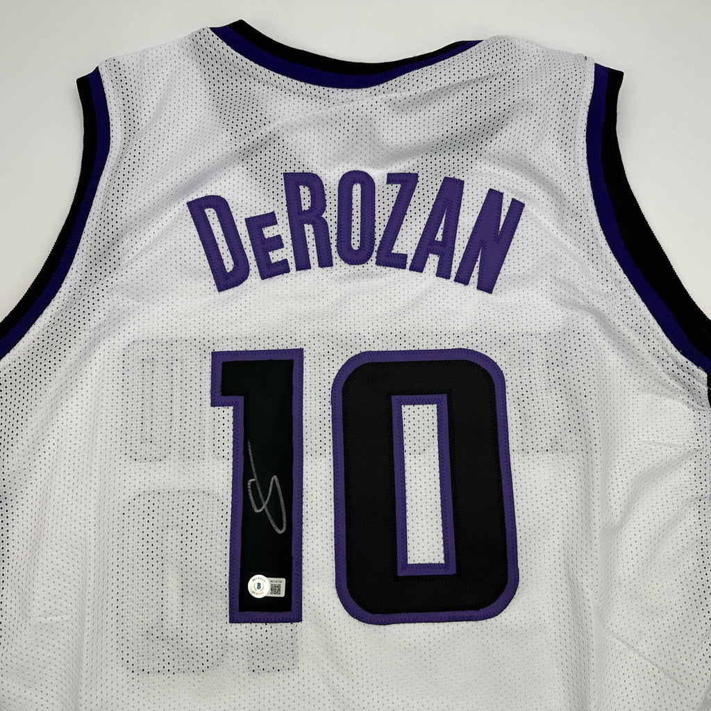 autographed-signed-demar-derozan-sacramento-white-basketball-jersey-beckett-bas-coa