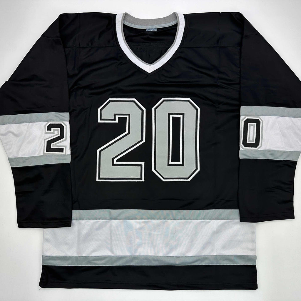 autographed-signed-luc-robitaille-hof-09-los-angeles-la-black-hockey-jersey-jsa-coa