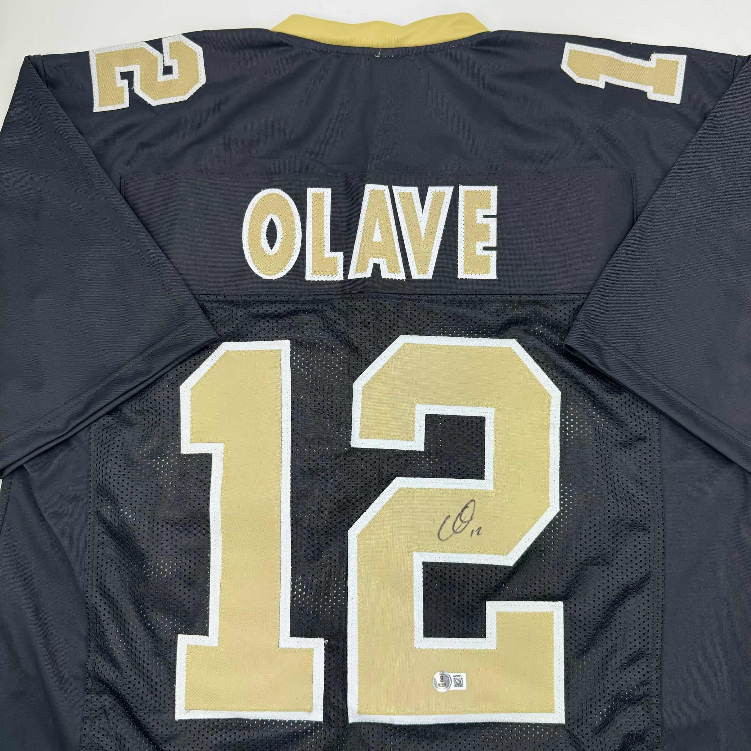 autographed-signed-chris-olave-new-orleans-black-football-jersey-beckett-bas-coa