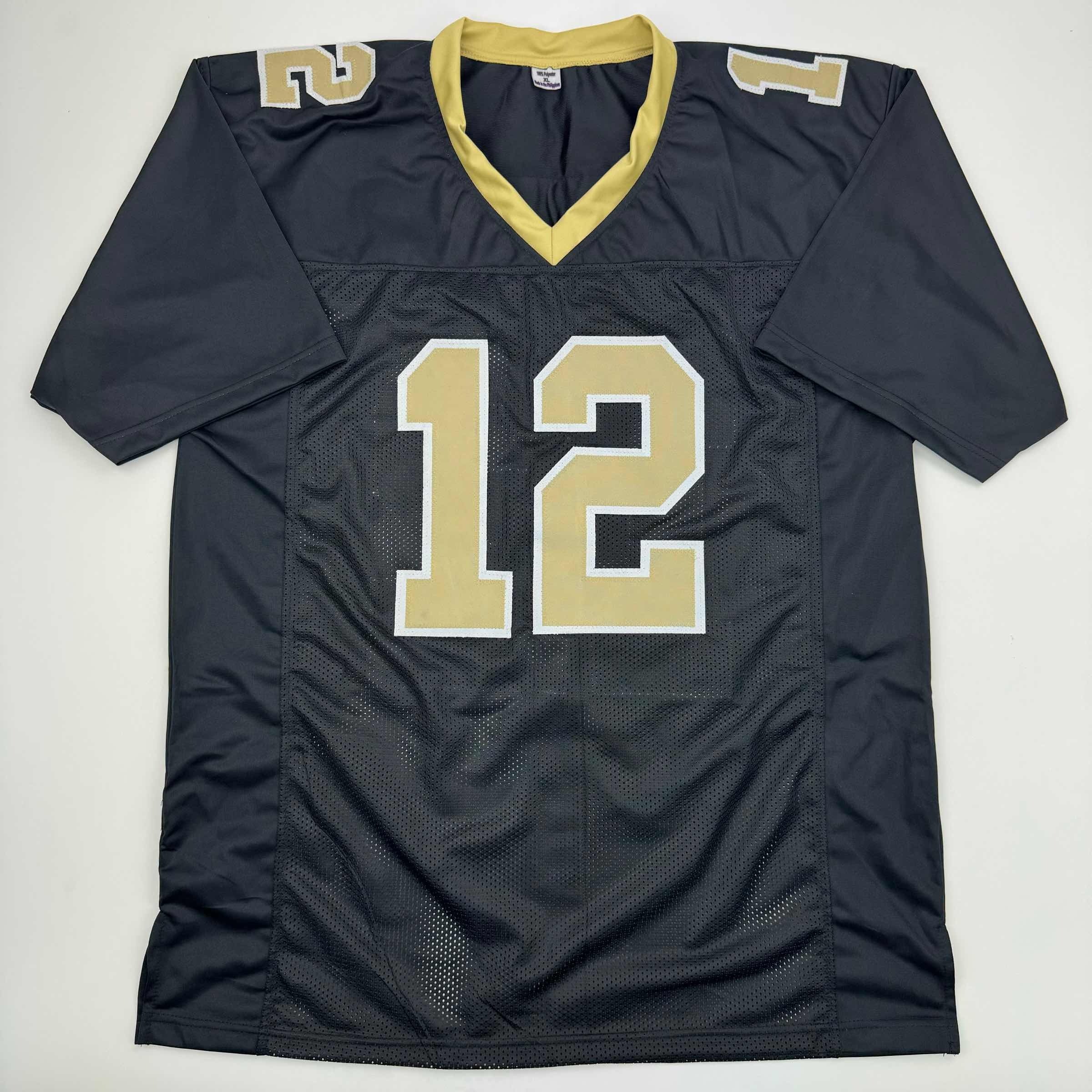 autographed-signed-chris-olave-new-orleans-black-football-jersey-beckett-bas-coa